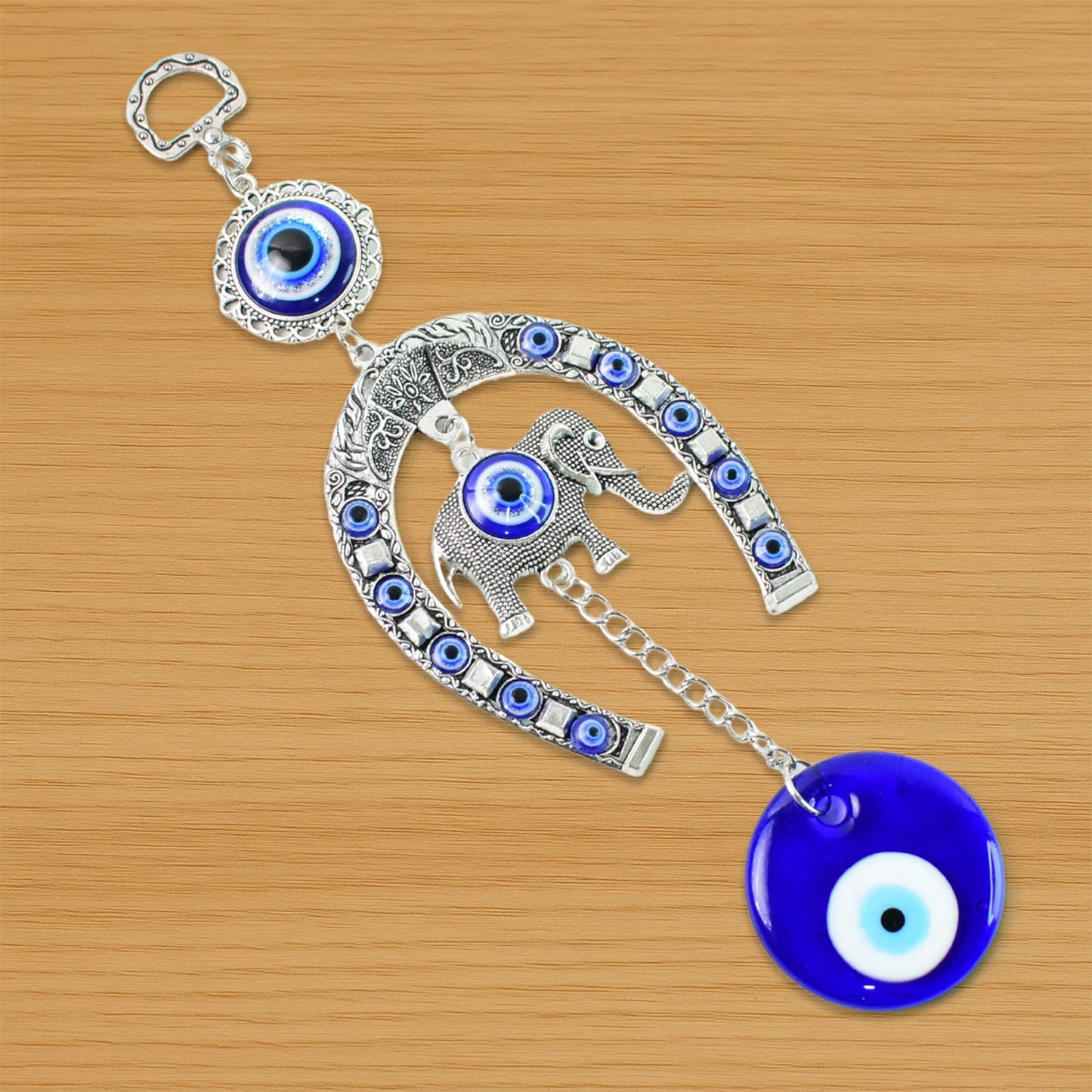 Handcrafted evil eye wall hanging featuring beads and tinkling chime