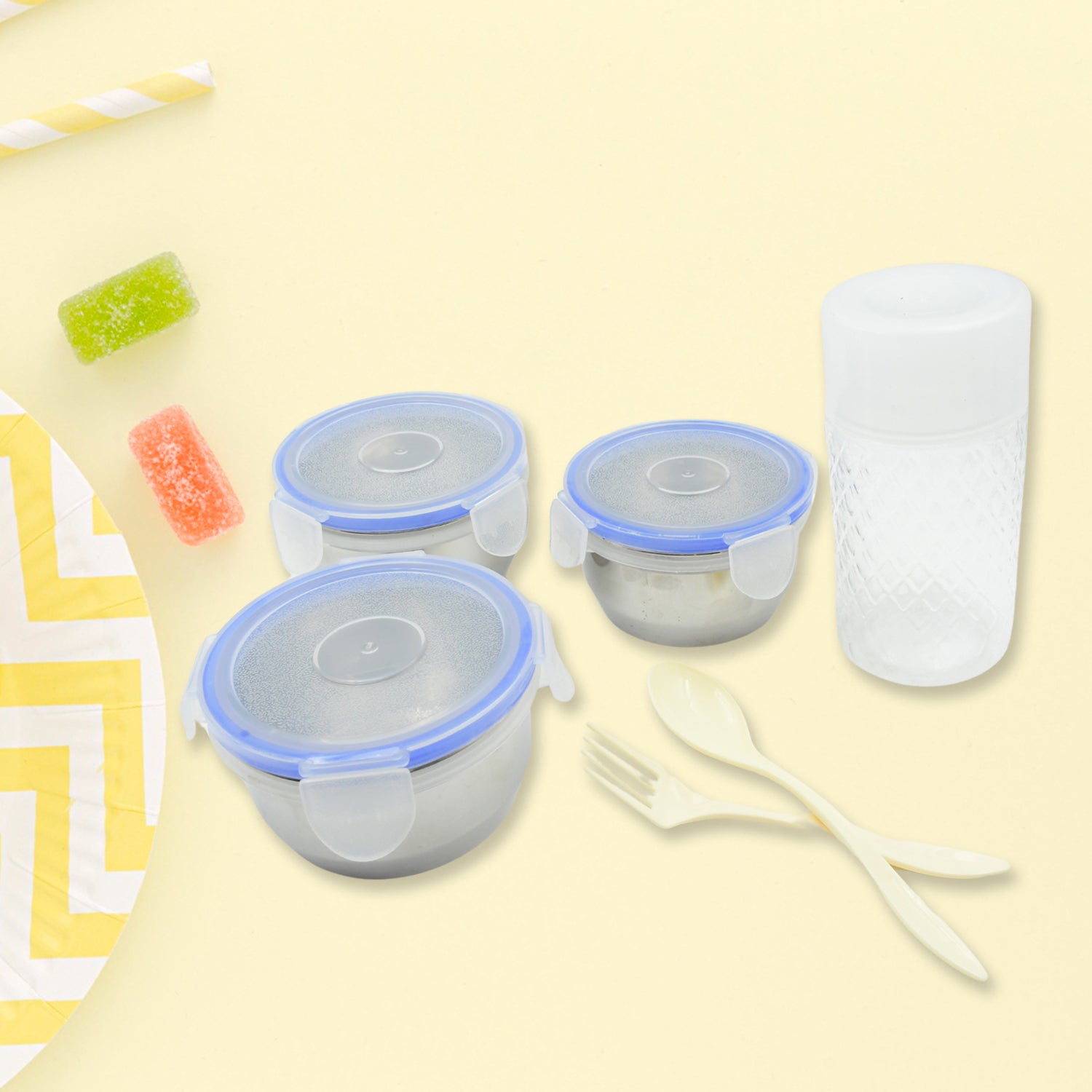 Stainless steel containers with airtight plastic lids, preventing leakage of liquids.
