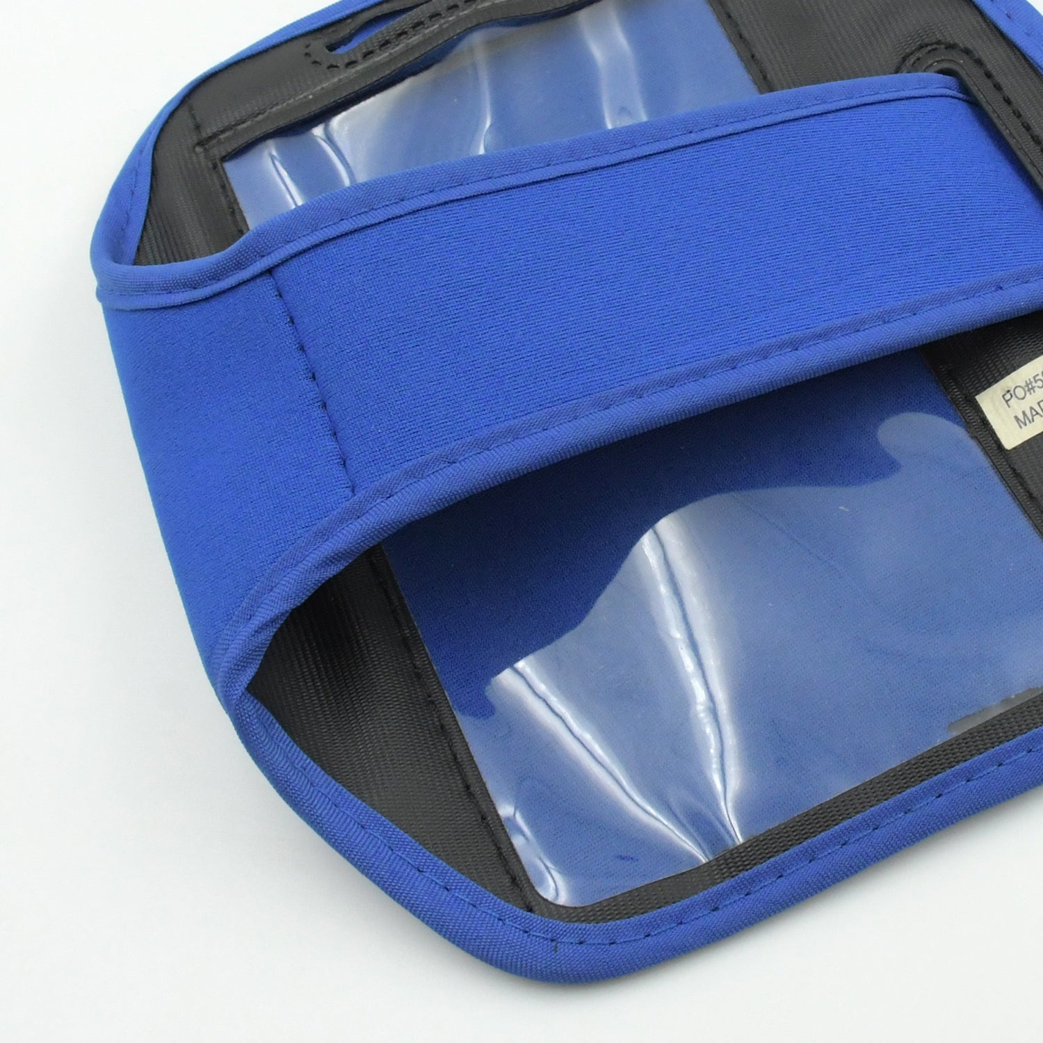 Side view of the running armband, illustrating its slim profile and how it sits on the arm.