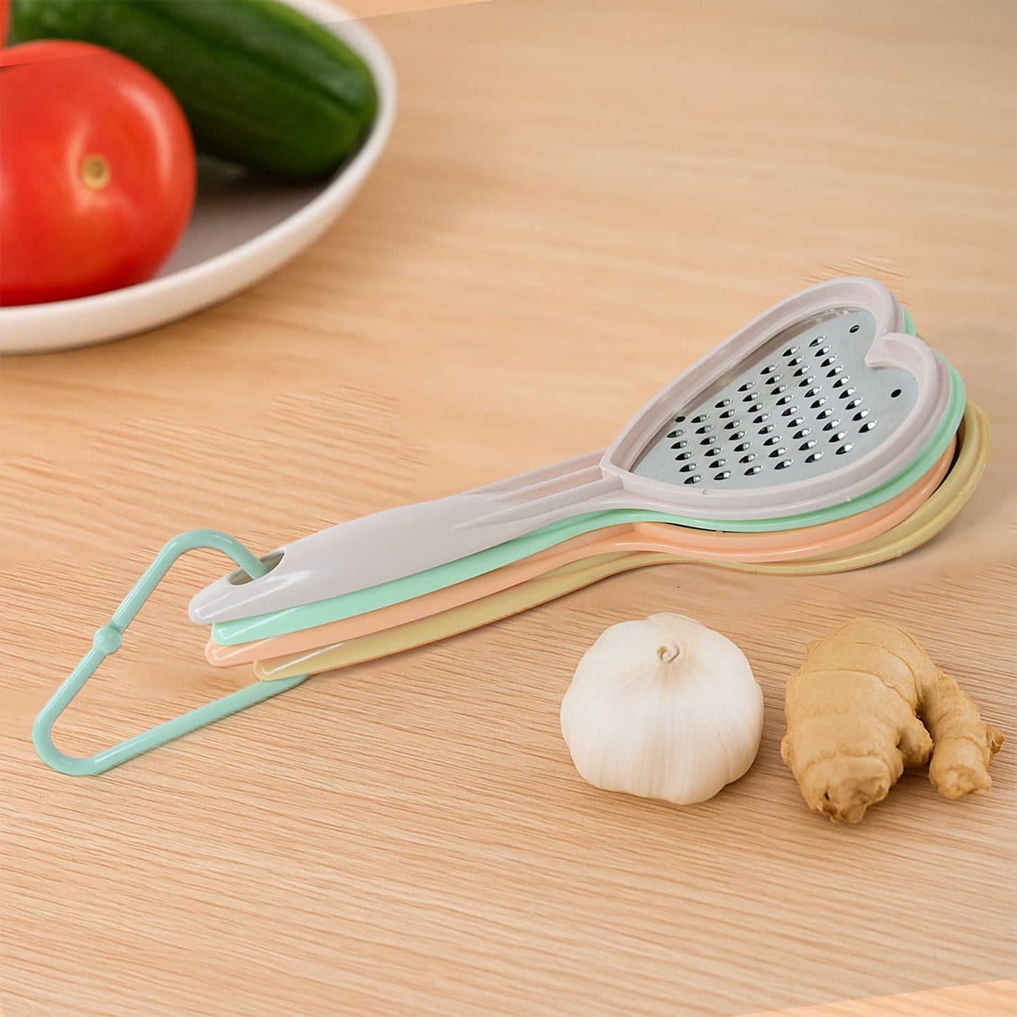 The heart-shaped slicer in action, neatly cutting vegetables for a healthy meal.