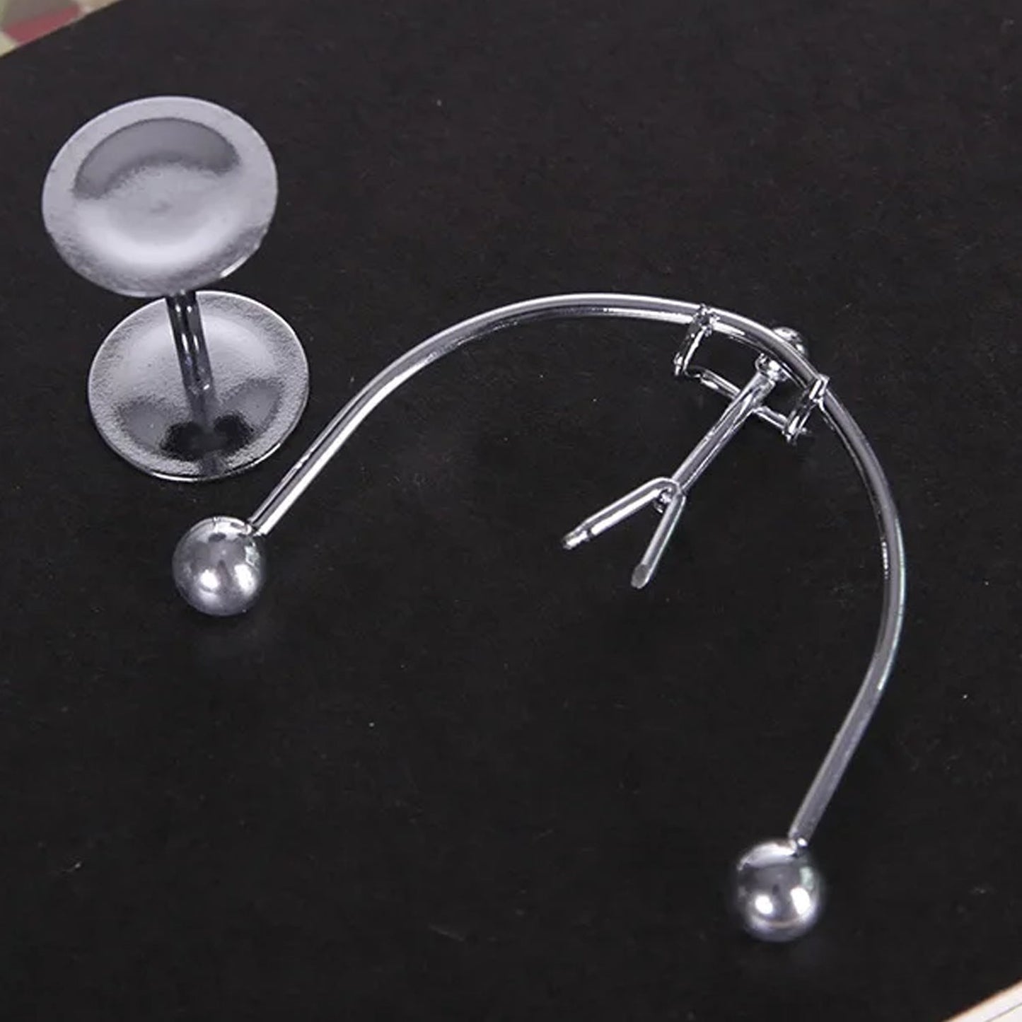 A desk toy balance ball in action, providing a calming visual experience.