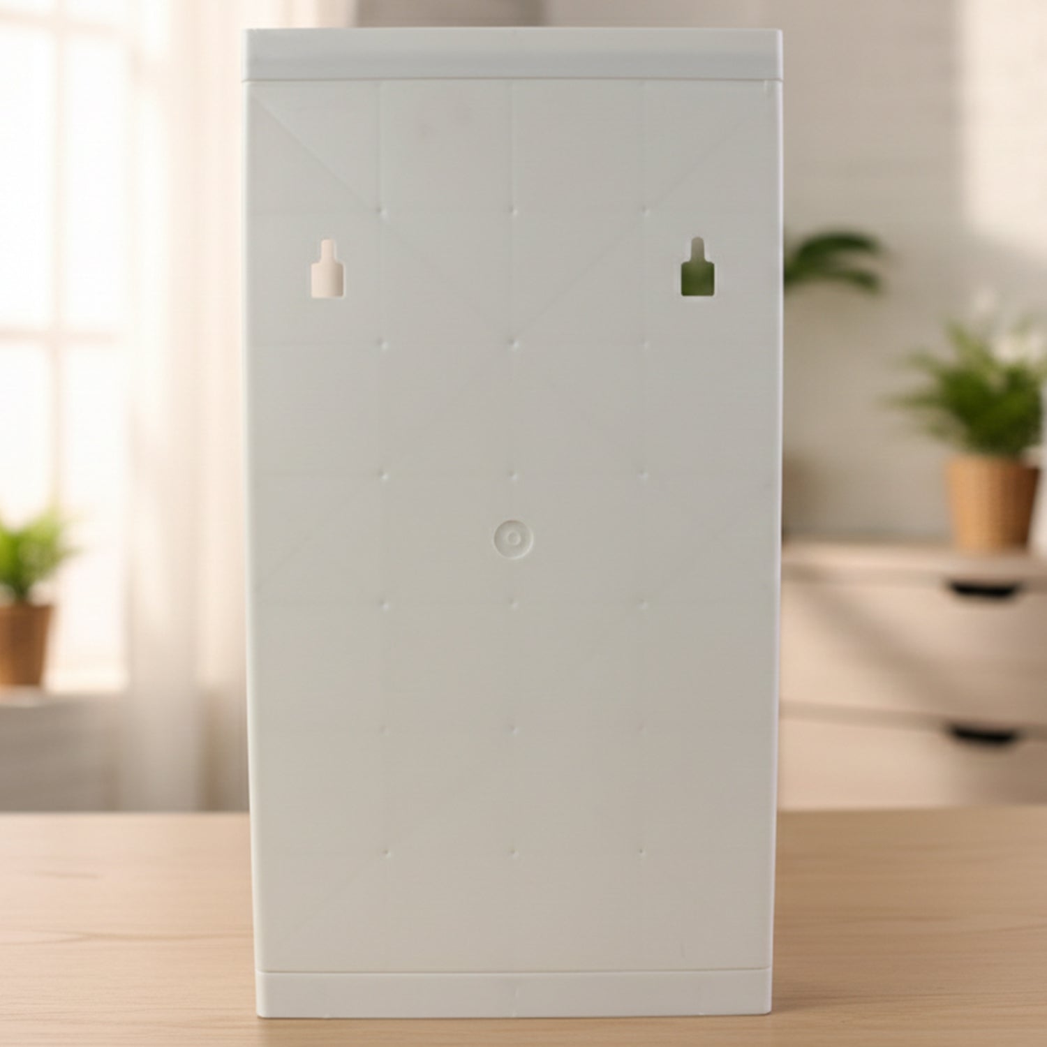 Compact multipurpose bathroom storage unit with rotating mirror door
