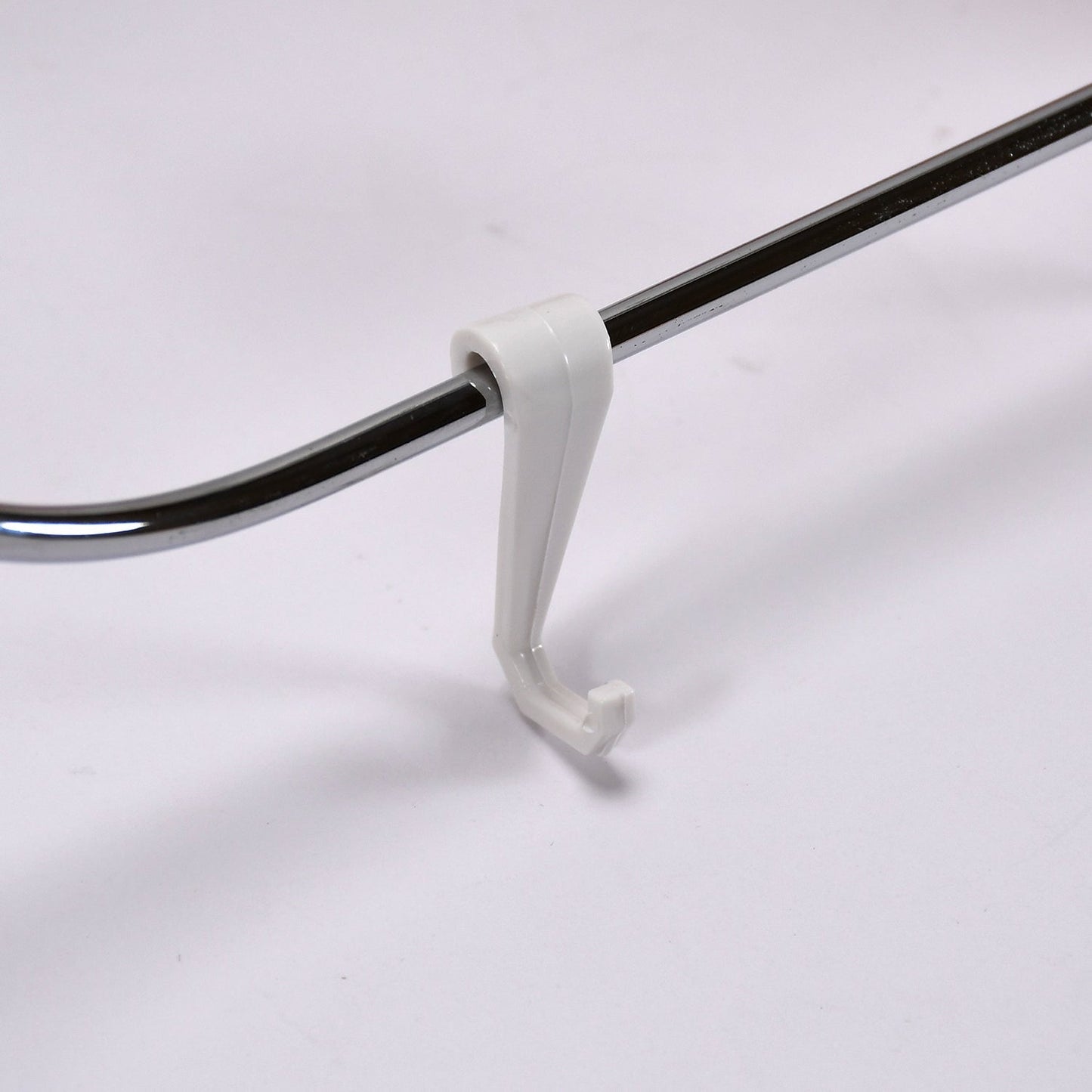 Close-up of the foldable storage rack showing its sturdy ABS and steel construction.