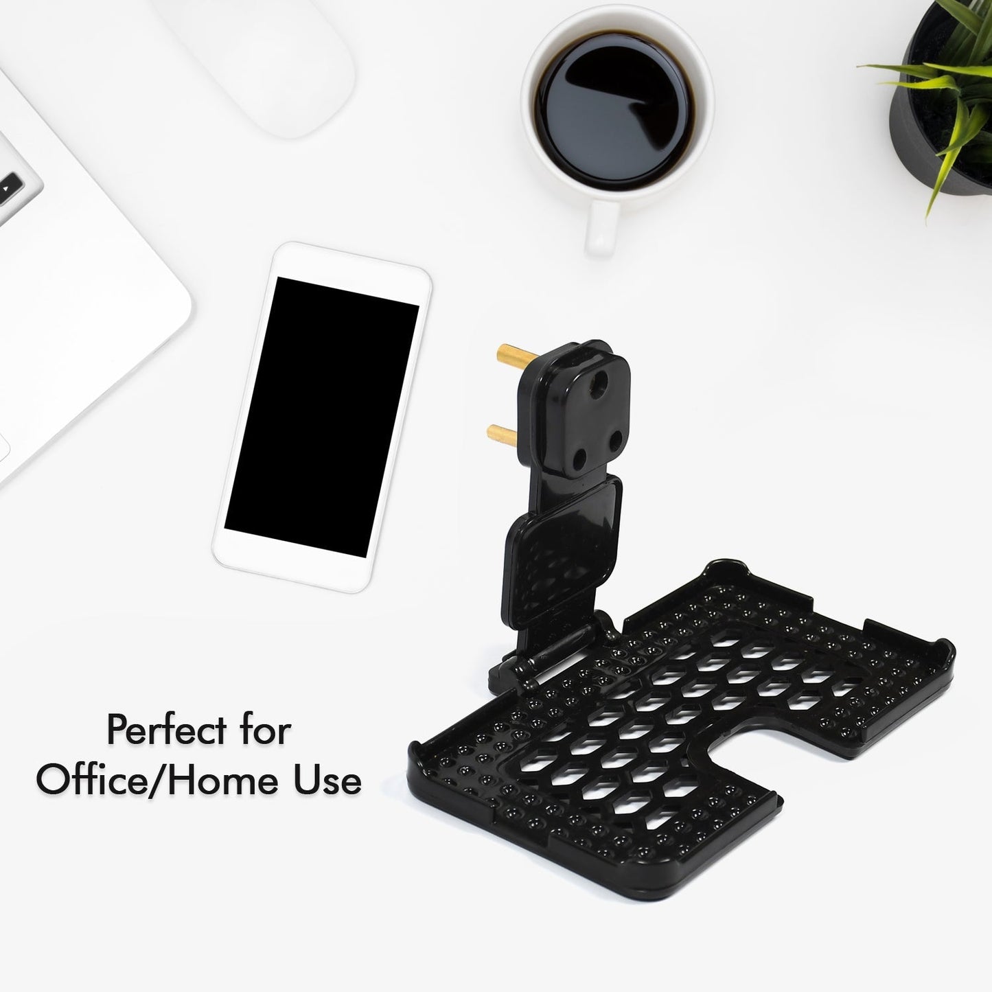 PHOBIA black mobile charging wall holder securely installed on a power socket.