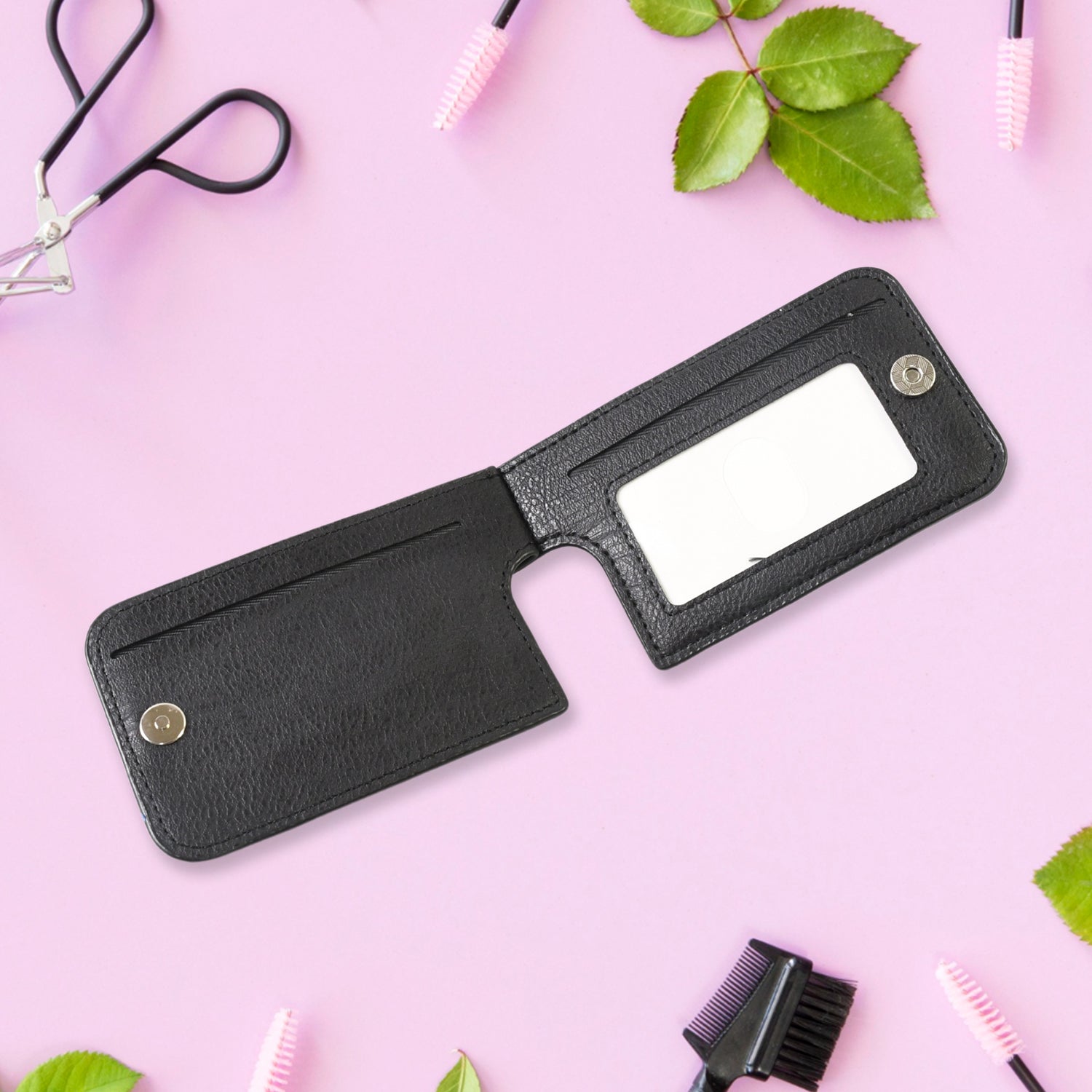 Open zipper pocket of the adhesive phone card holder, showing cards inside.
