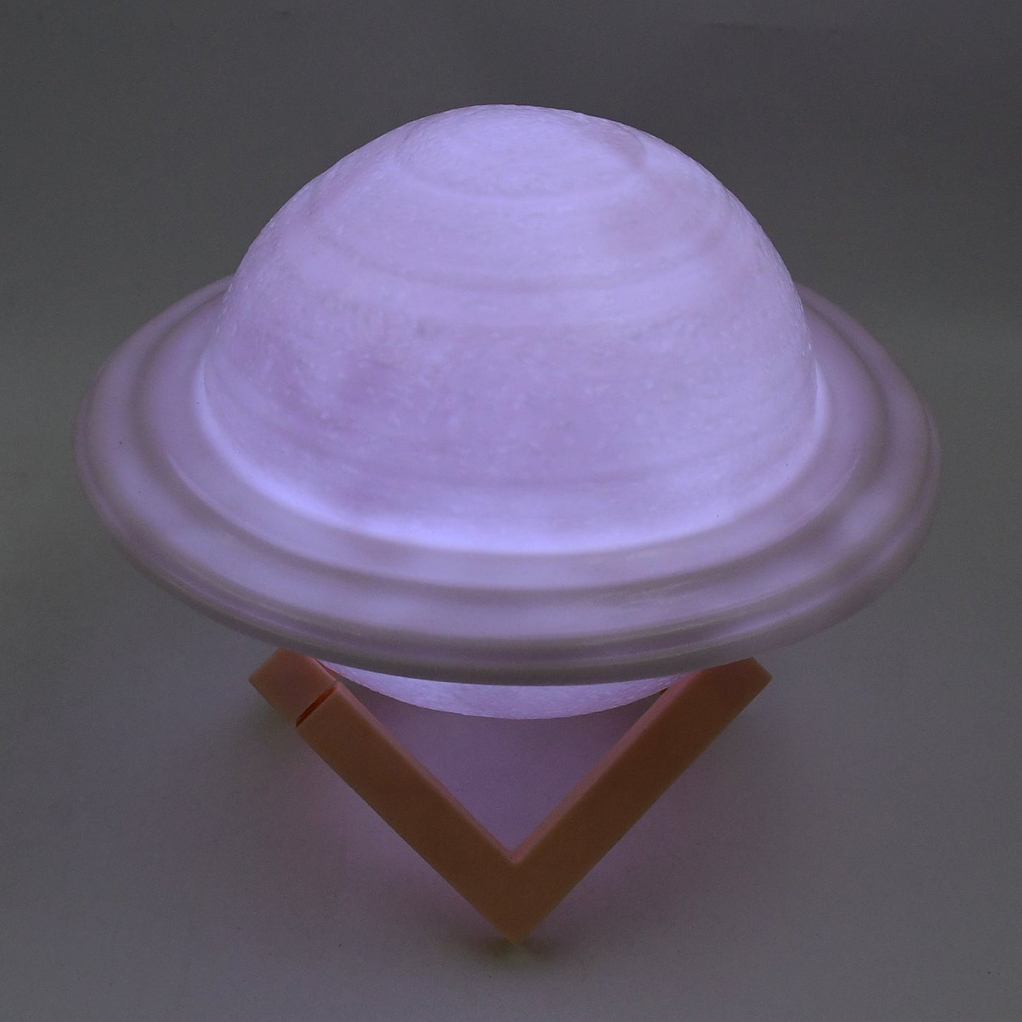 Close-up of the textured surface of the 3D Saturn night light.