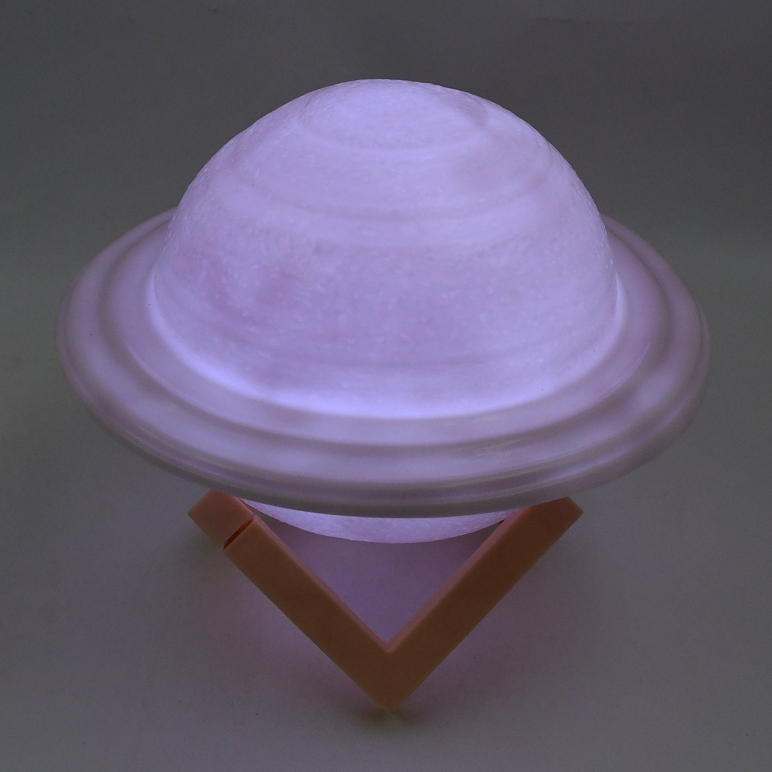 Close-up of the textured surface of the 3D Saturn night light.