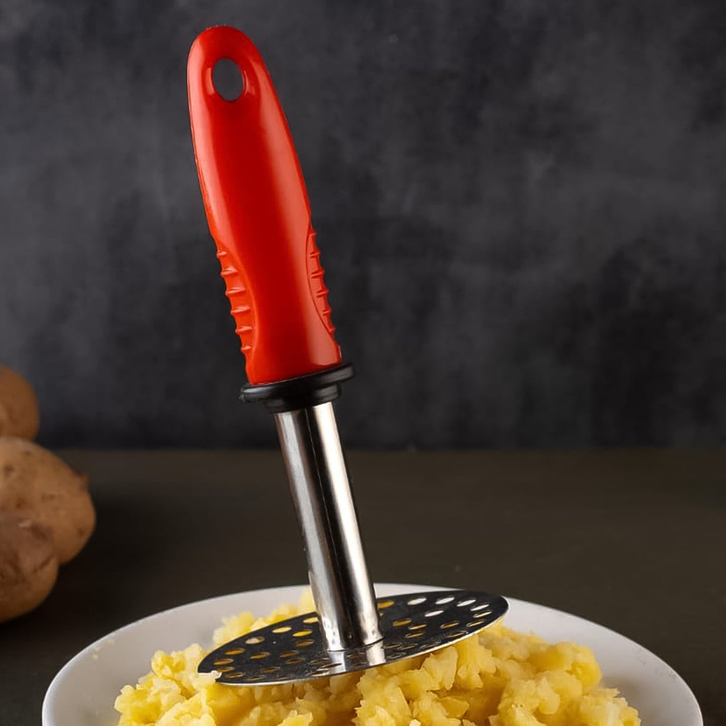 Pav bhaji masher with steel mesh head and plastic handle