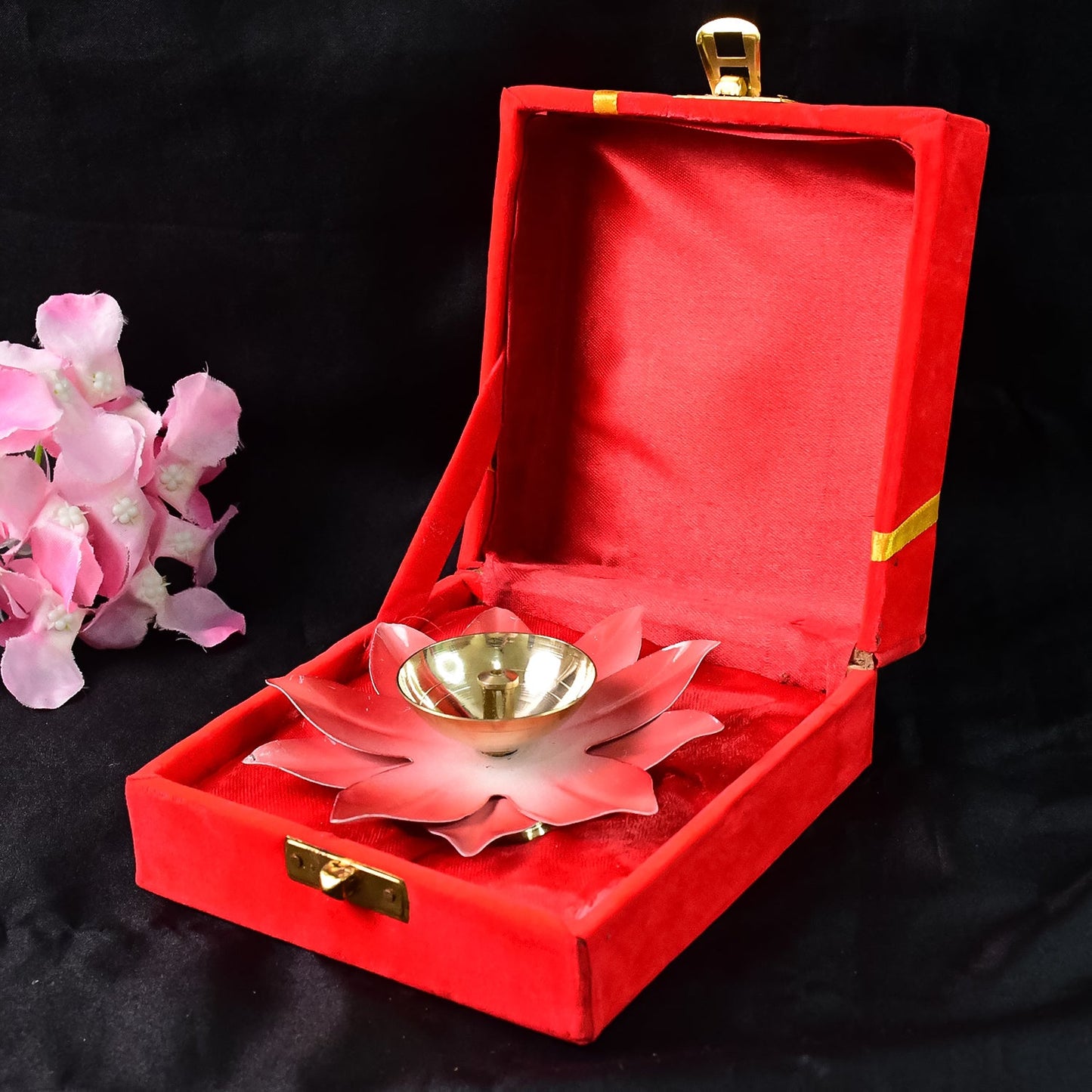 Brass oil diya with lotus flower design used for home temple decor