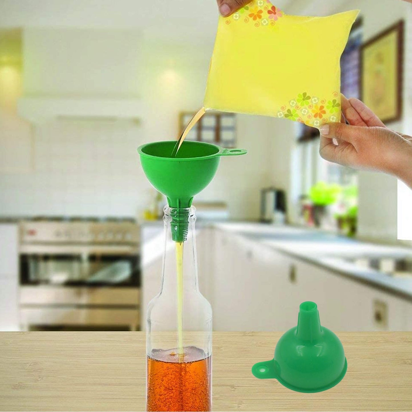 Ergonomic design of the green silicone funnel for comfortable handling.