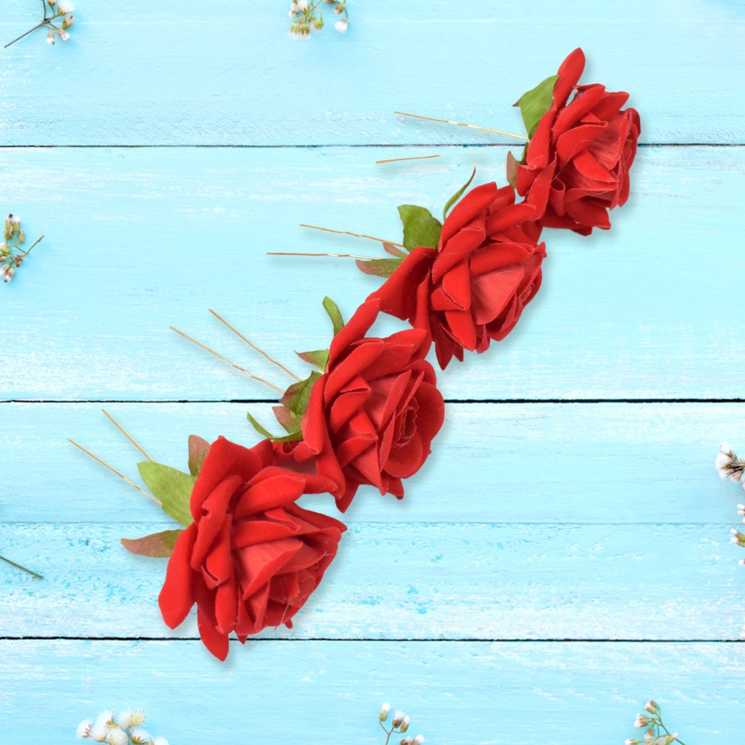 Various red rose bridal hair clips arranged, highlighting their versatile use.