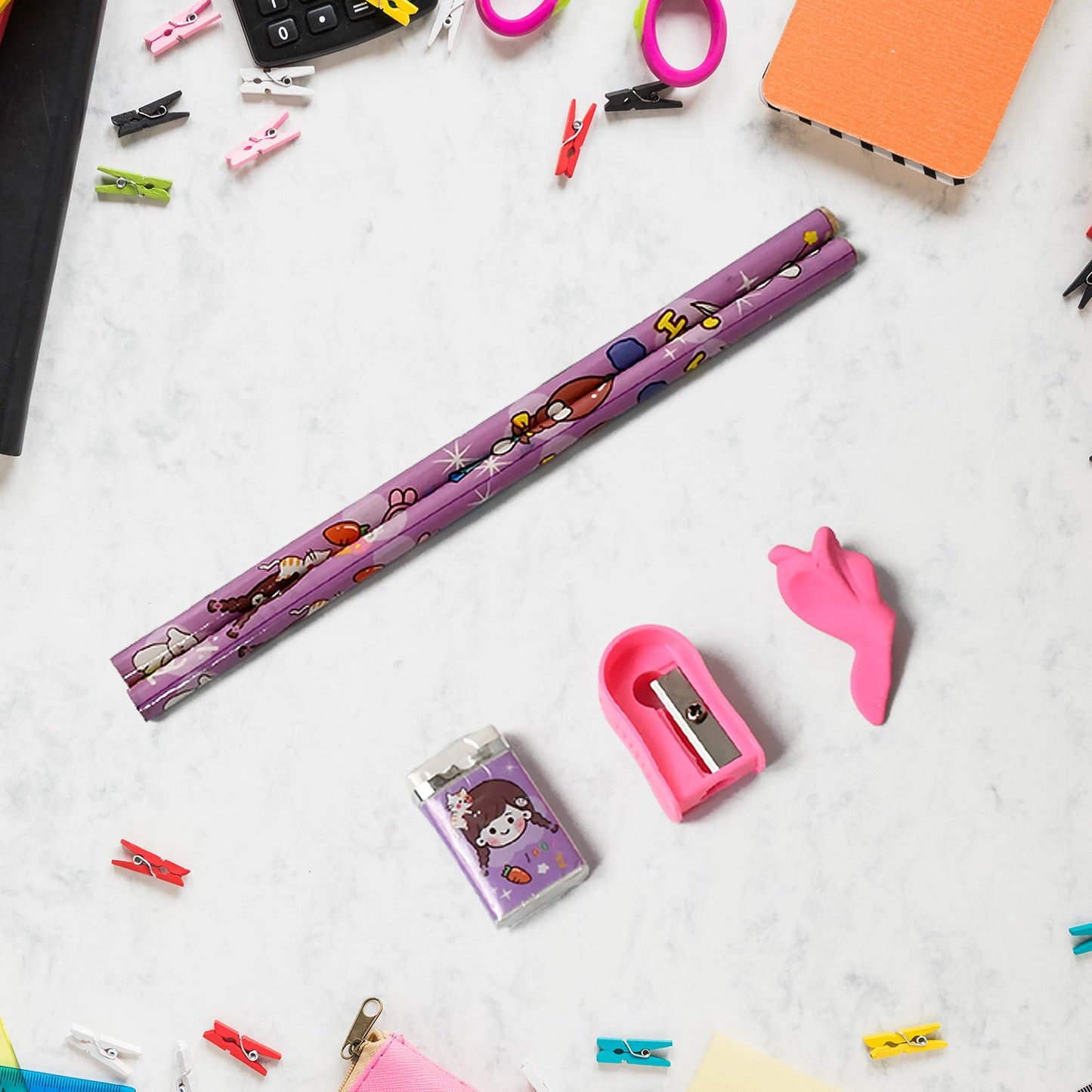 Brightly colored pencil sharpener and eraser, essential for any kids stationery kit.