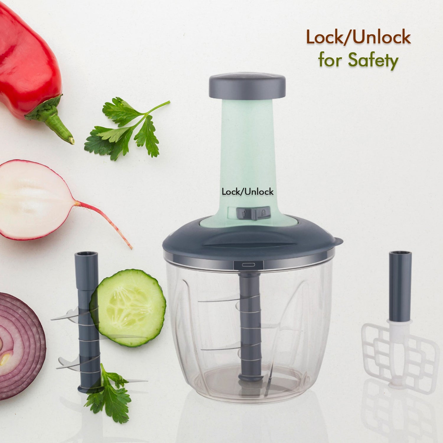 Disassembled parts of the Quickslice vegetable chopper, showing the container and stainless steel blades.