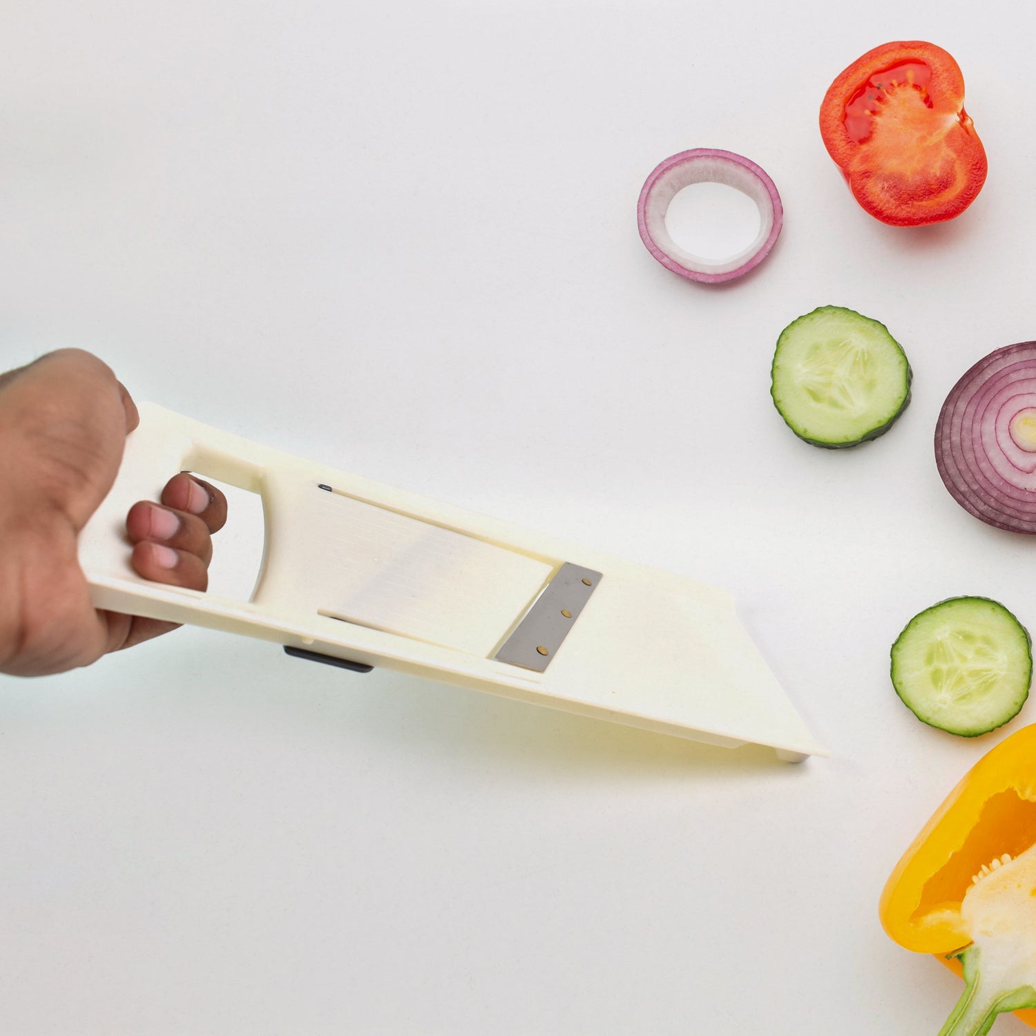 Various thin slices of vegetables demonstrating the multi-slice capability.