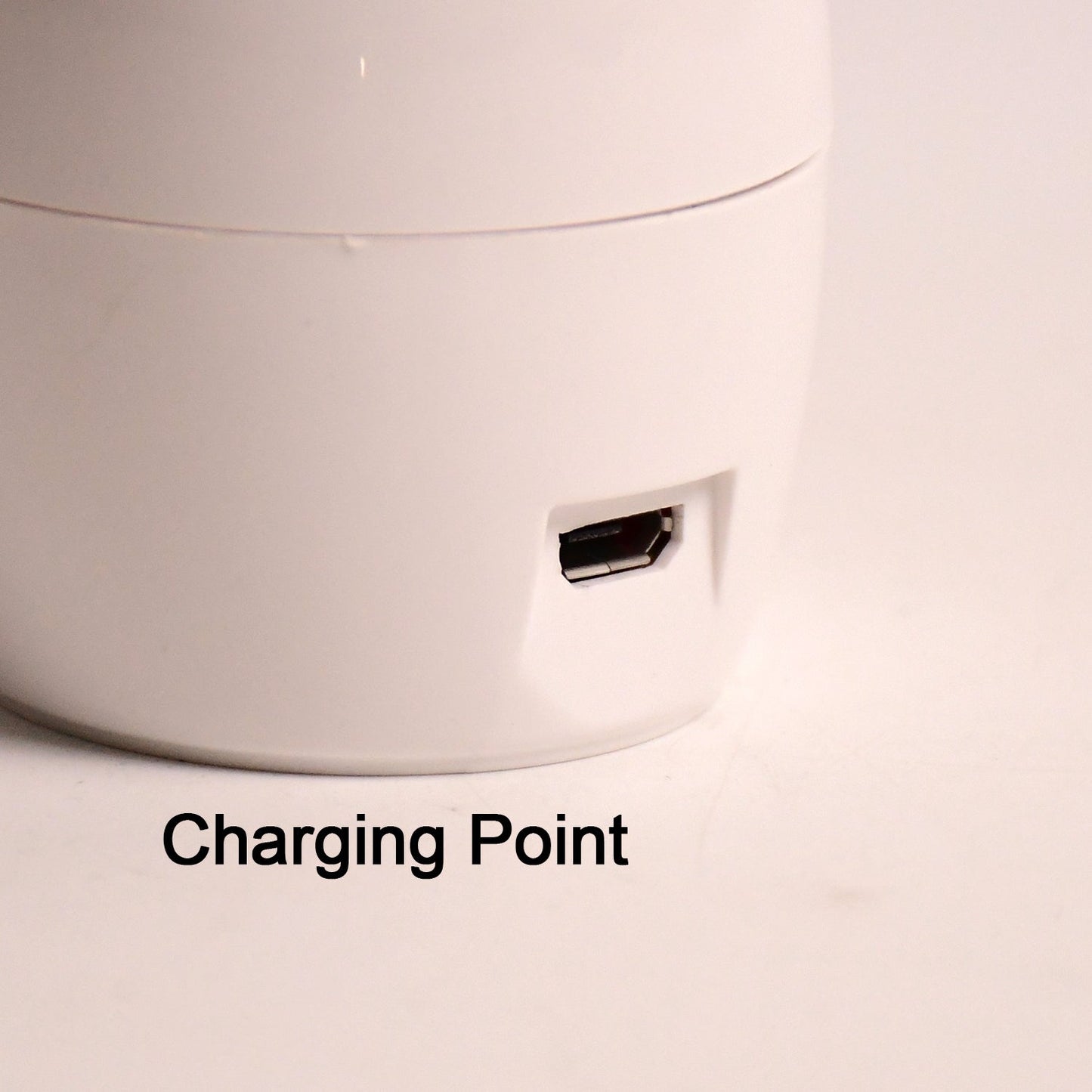 Side angle of plug-in LED nail dryer showing compact design