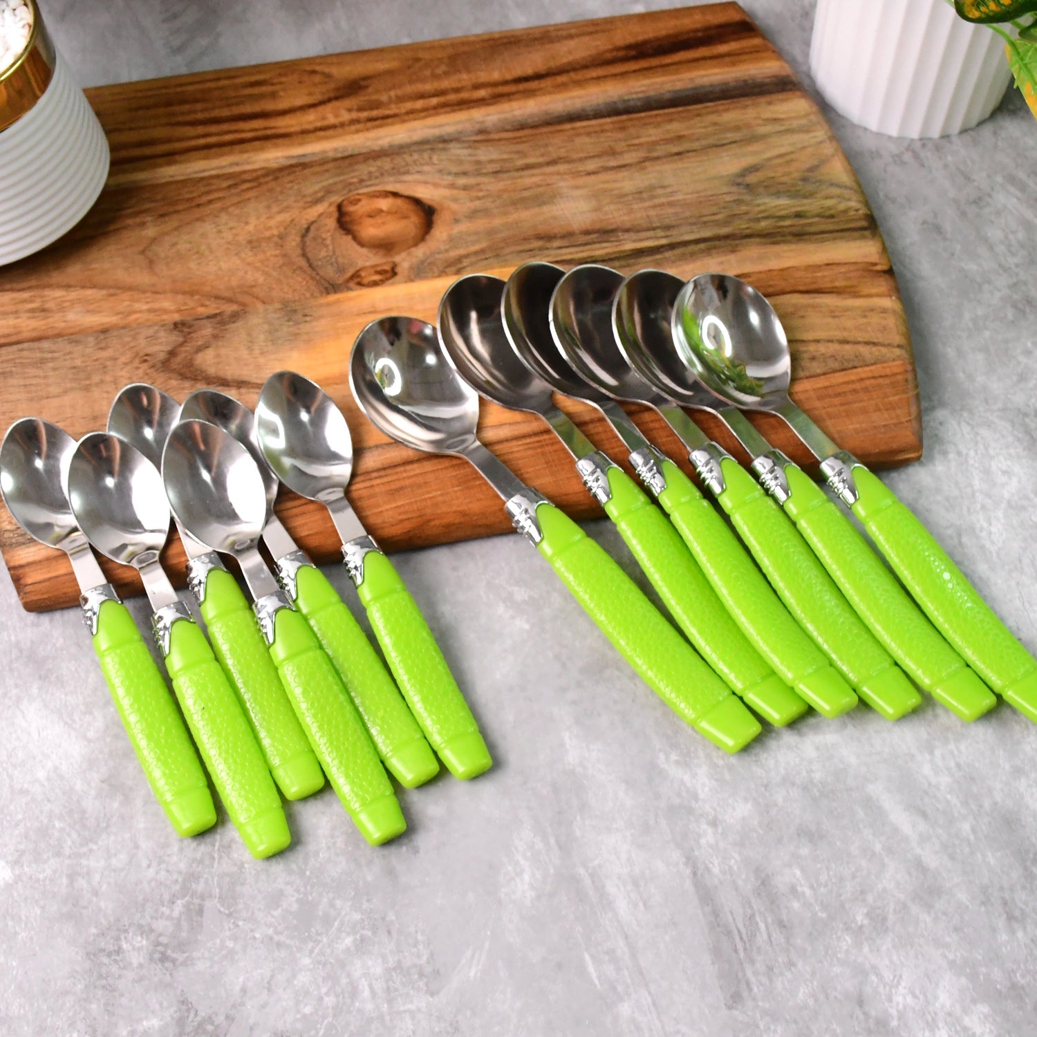 Premium cutlery set with stainless steel spoons and forks in holder