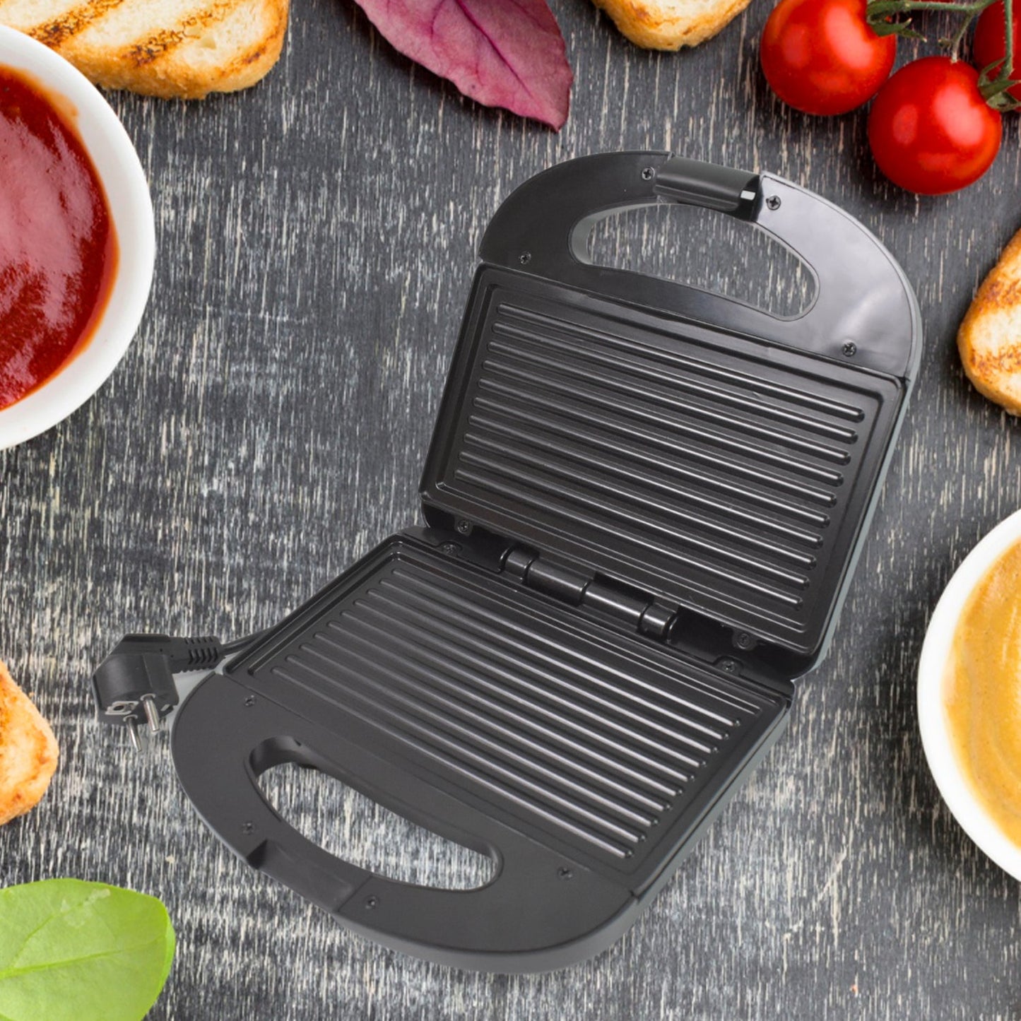 A delicious cheese sandwich toasting inside the hot ChefMates Sandwich Maker.