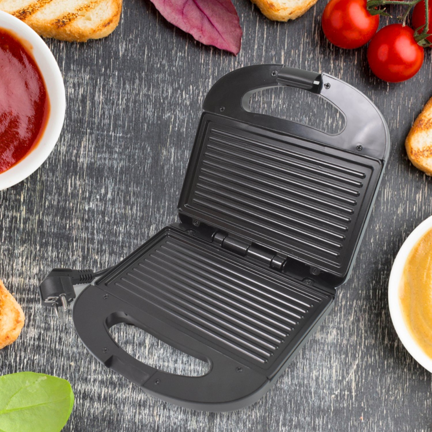 A delicious cheese sandwich toasting inside the hot ChefMates Sandwich Maker.