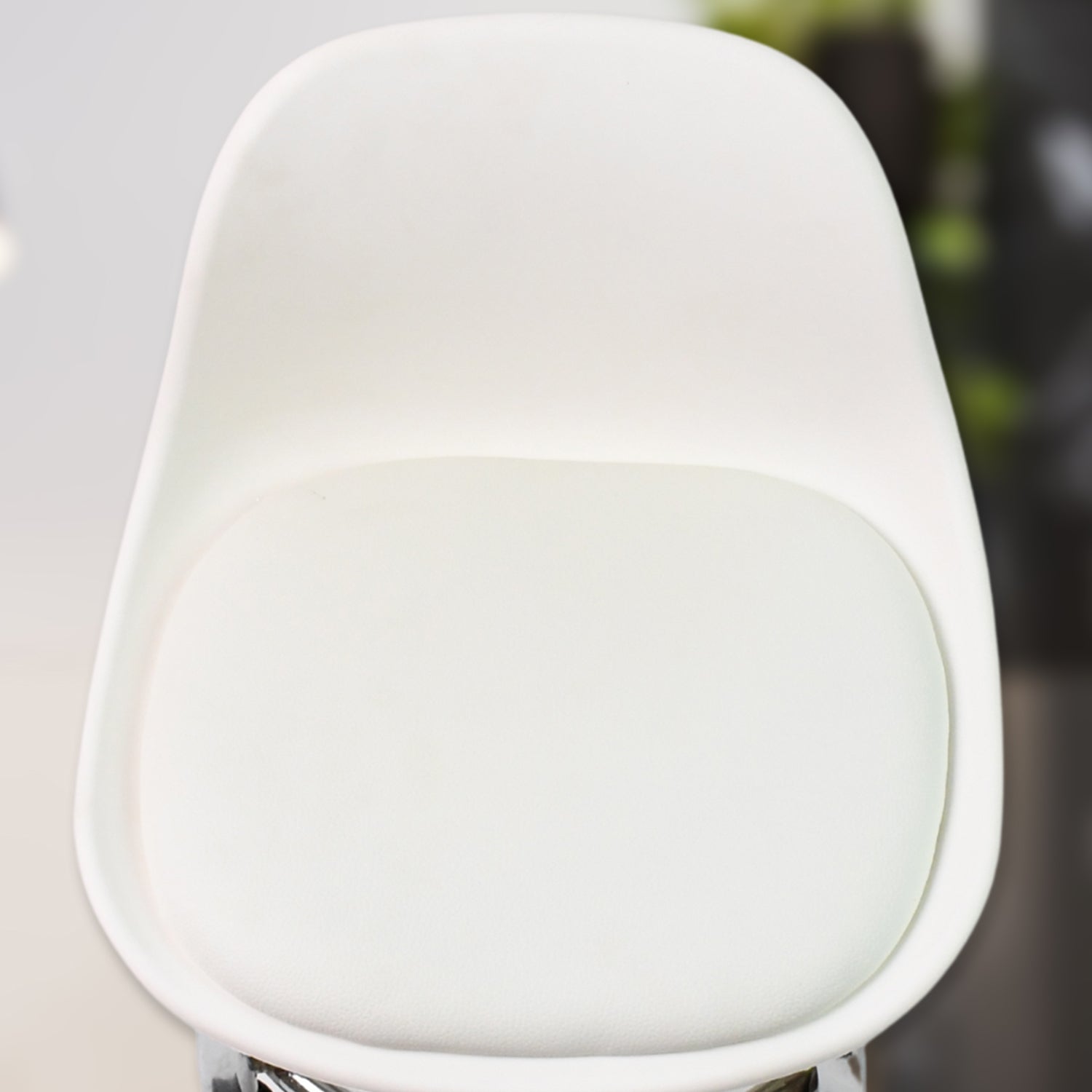 Detailed view of the heavy-duty steel base and durable construction of the rolling stool.