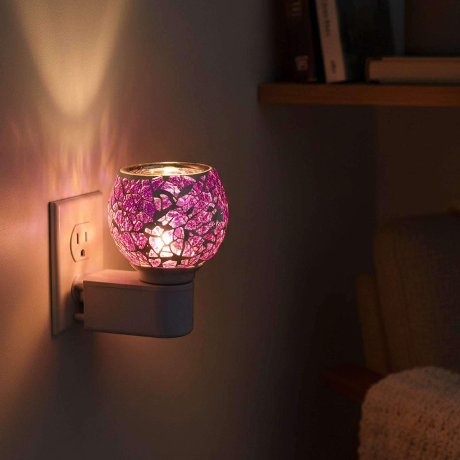 Plugged-in purple mosaic aroma diffuser lamp ready to diffuse calming fragrance