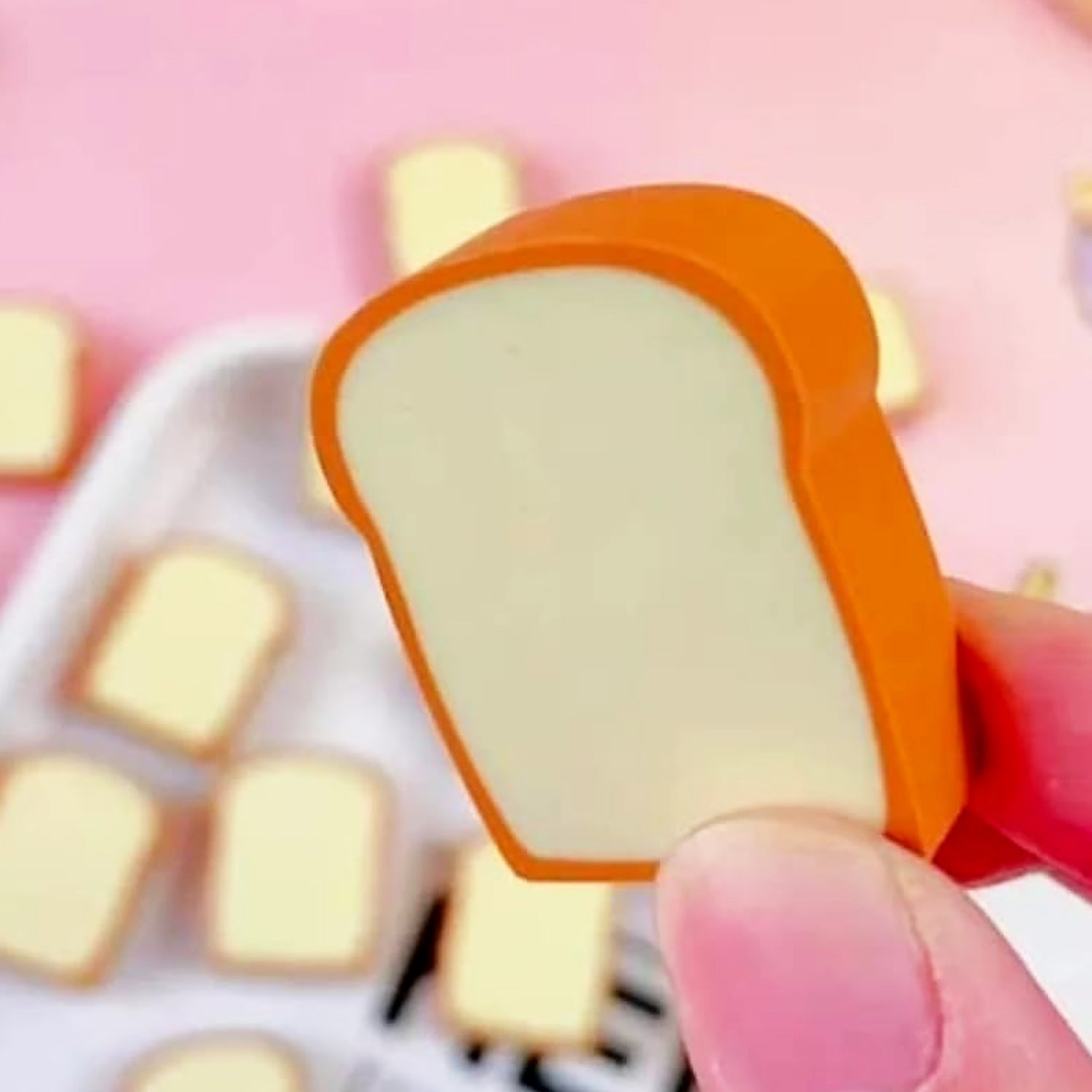 Overhead view of the delightful toast bread erasers, ideal for students.