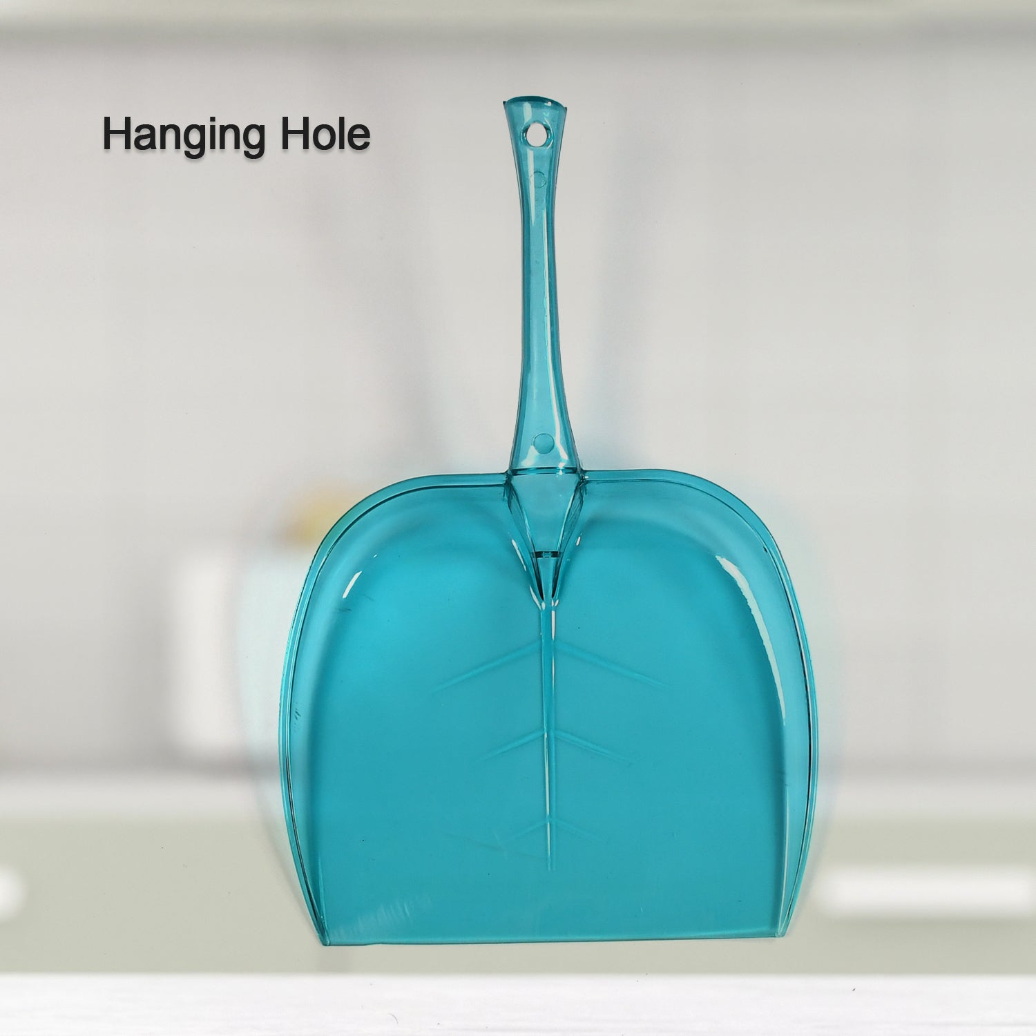 Easy-to-clean plastic dustpan with space-saving hanging feature