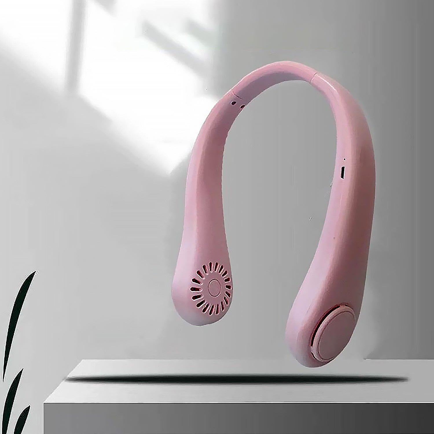 Main product shot of the  portable bladeless neck fan.