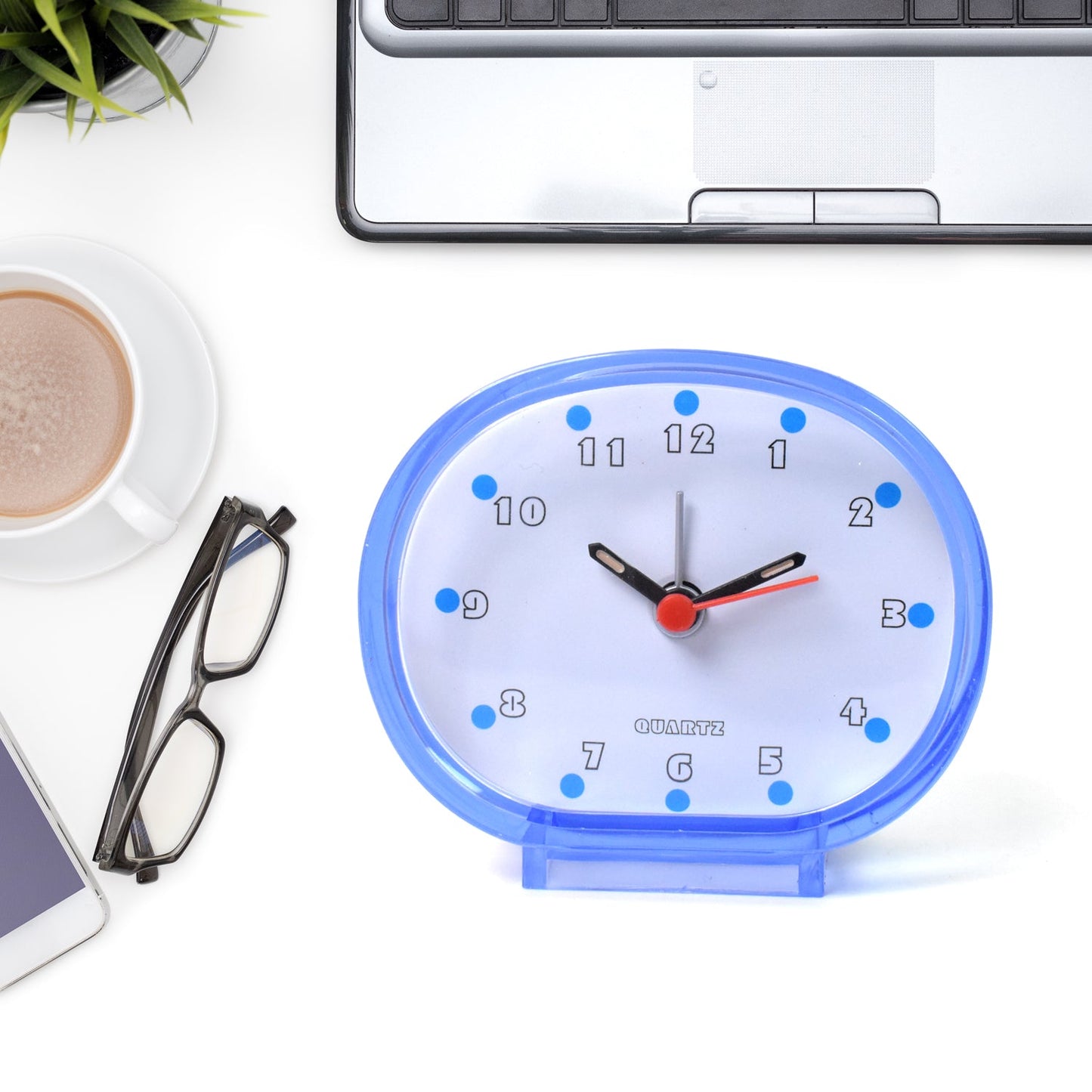 Side view of small table clock in mix design style