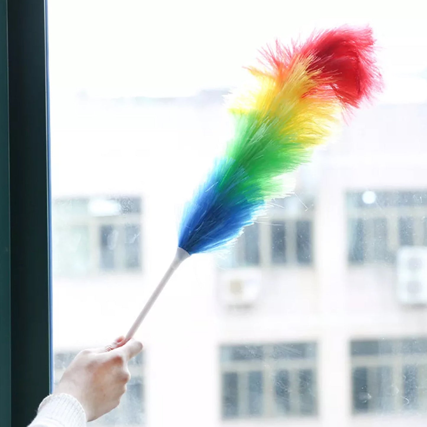 Ergonomic handle of a colourful microfiber cleaning duster.