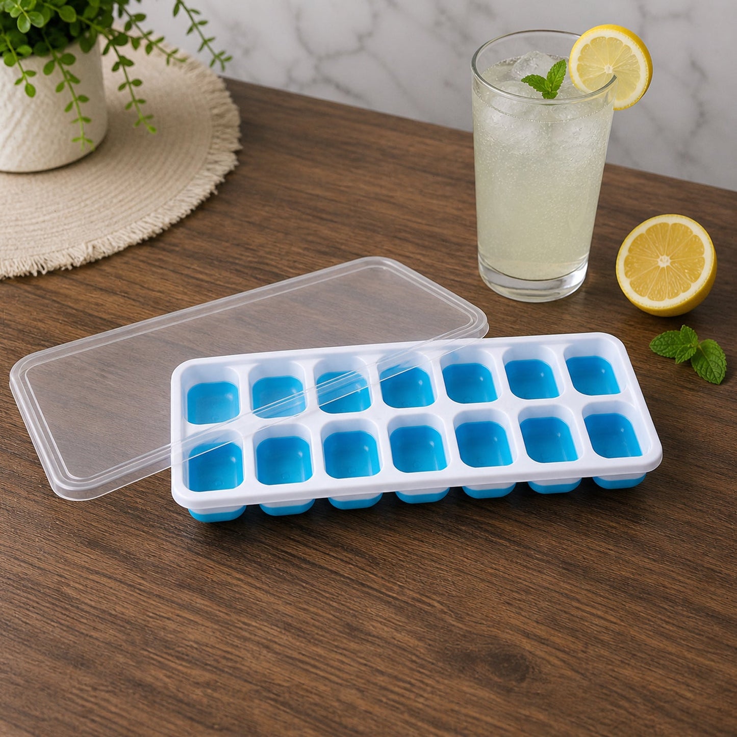 Ice cube tray filled with water on kitchen surface