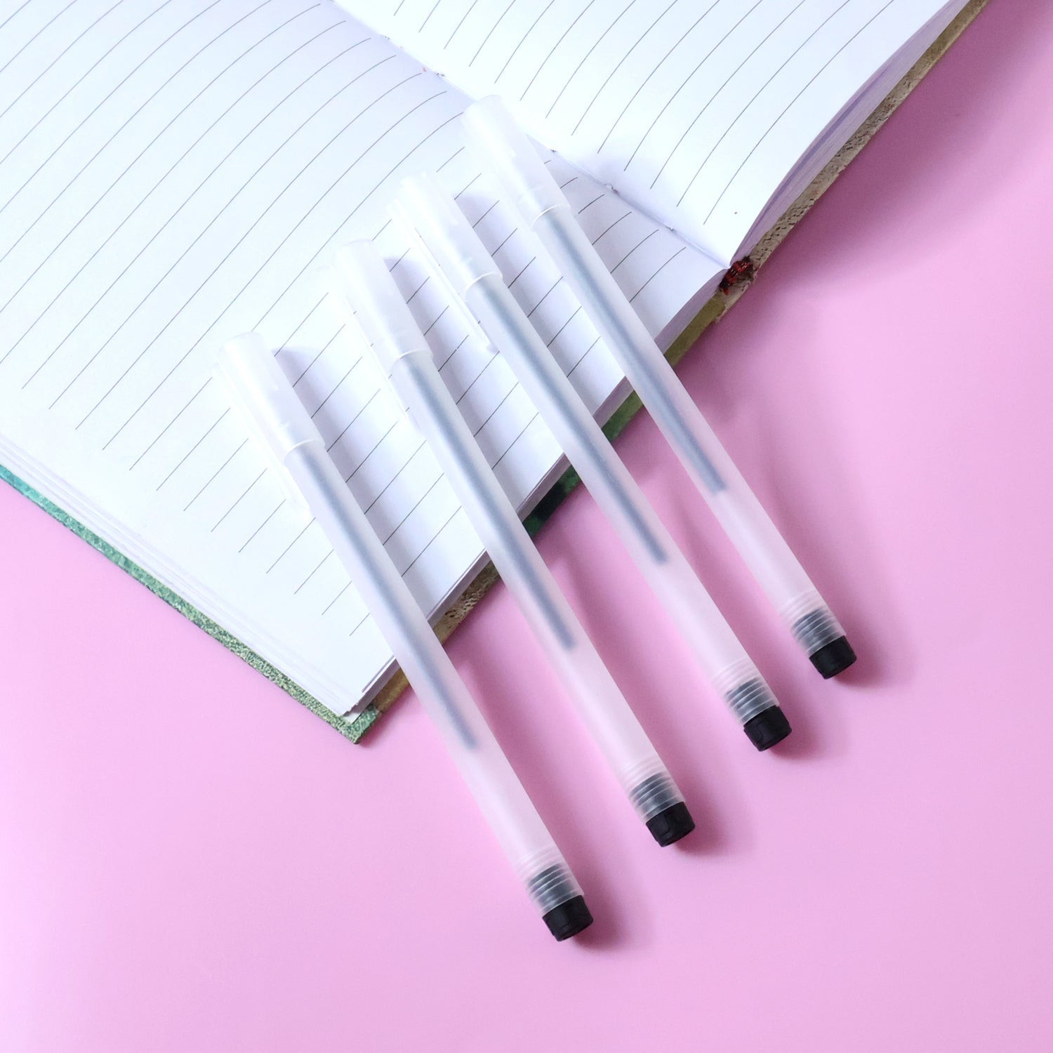 Close-up of black gel pens highlighting smooth writing and quick-drying ink
