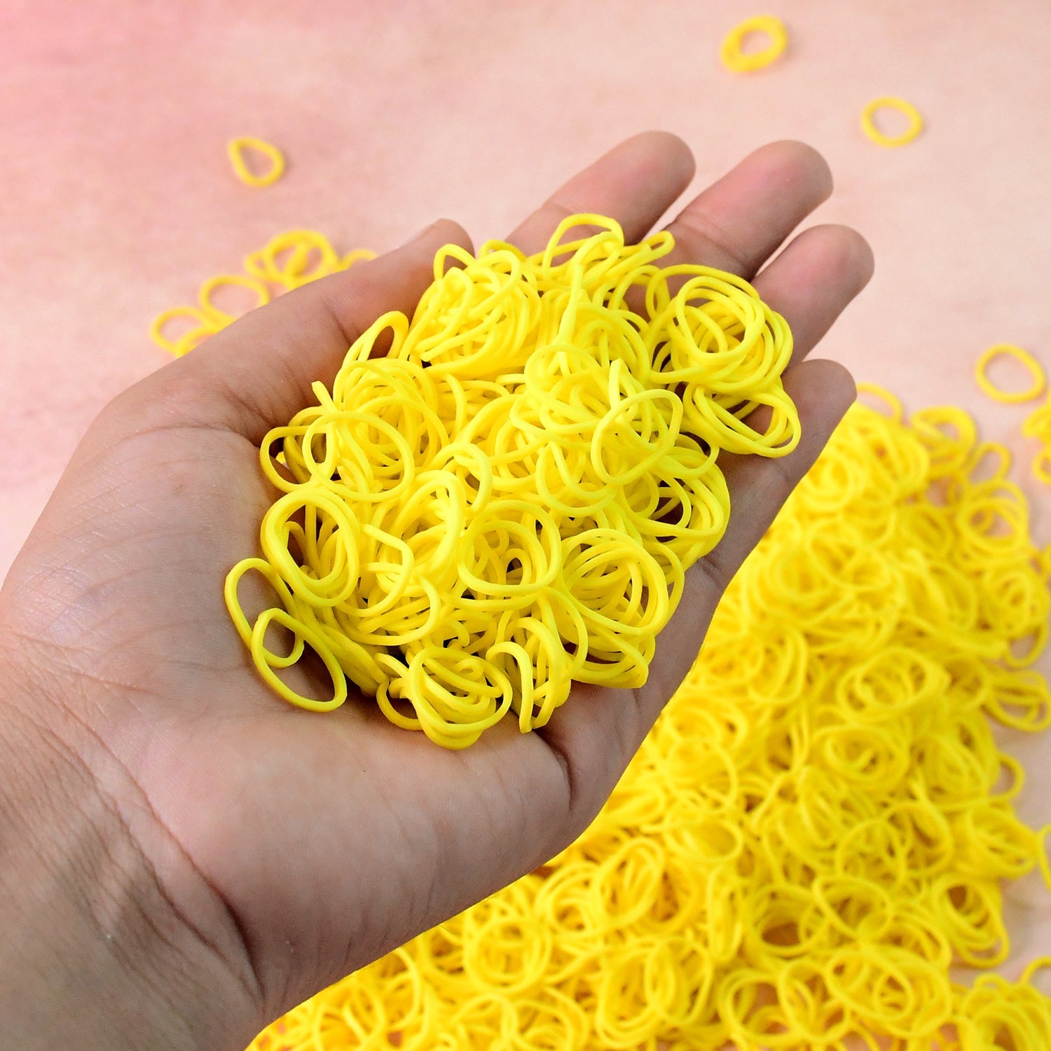 Set of reusable strong elastic rubber bands in orange color