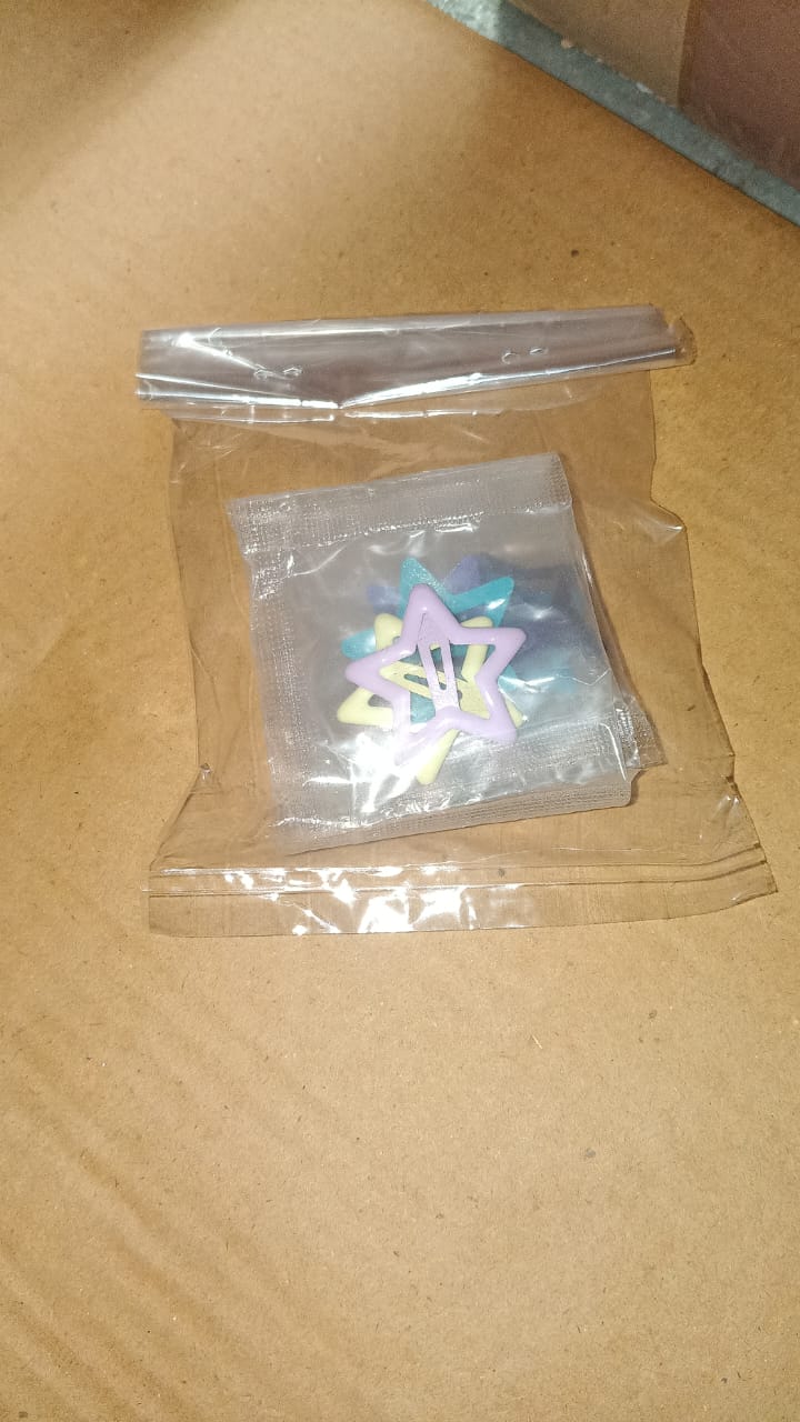 Close-up of colorful star hair clip highlighting bright colors