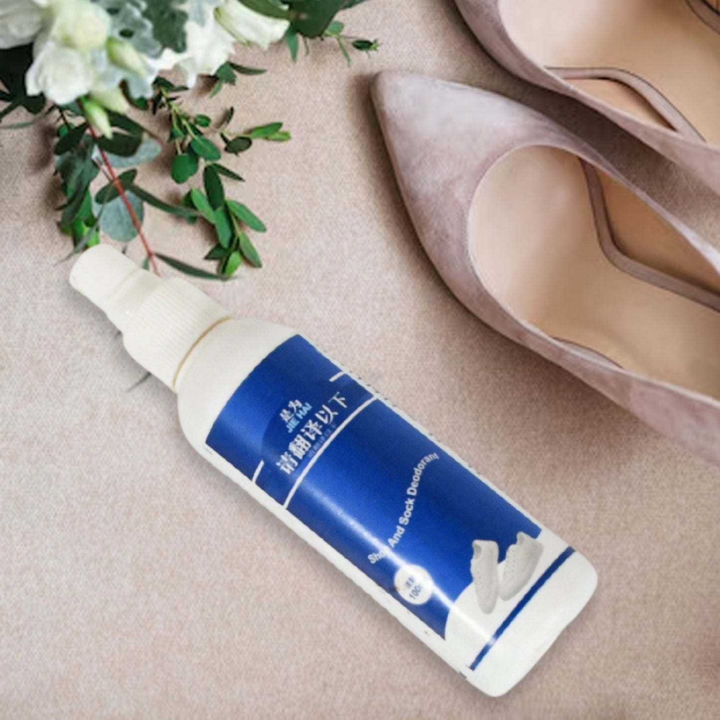Close-up of the fine mist nozzle on the Velvet Wheels shoe odor eliminator spray bottle.