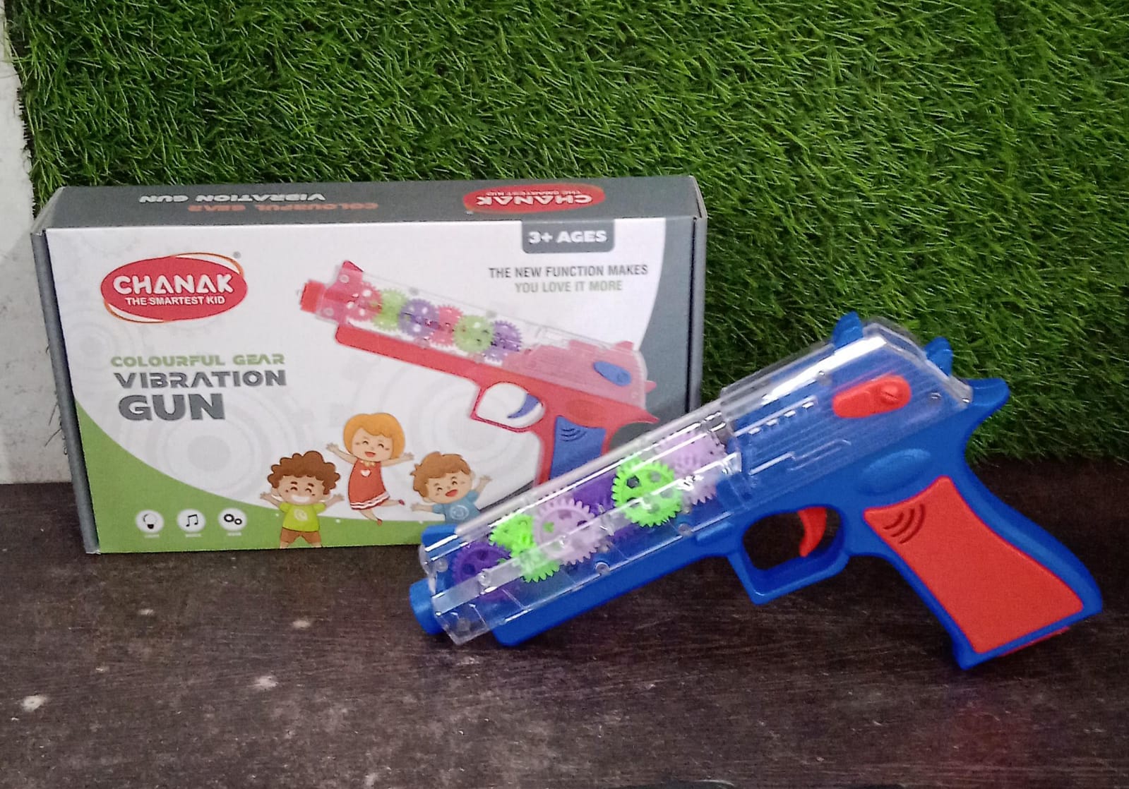 Another angle of the Aditi Transparent Gear Toy Gun, highlighting its engaging features.