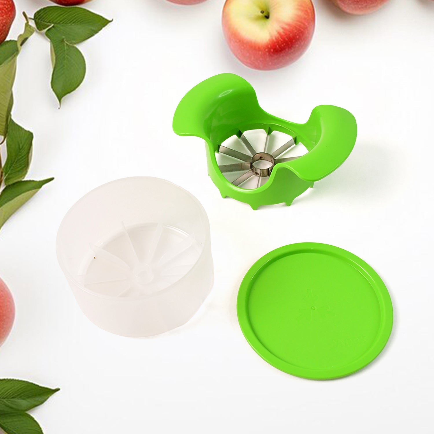 Top view of apple cutter showing stainless steel blades and grip