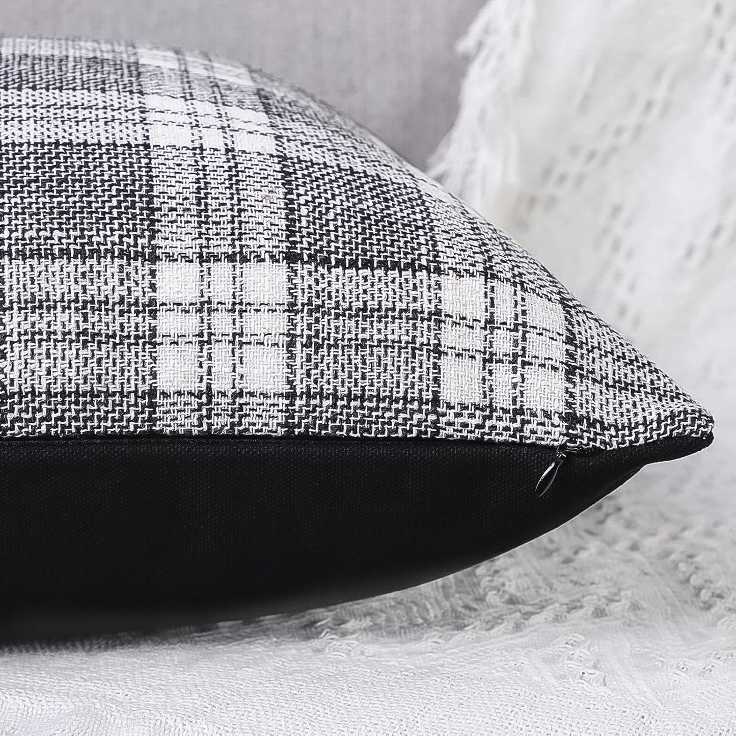 Detail shot of the soft faux leather side of a decorative cushion case.