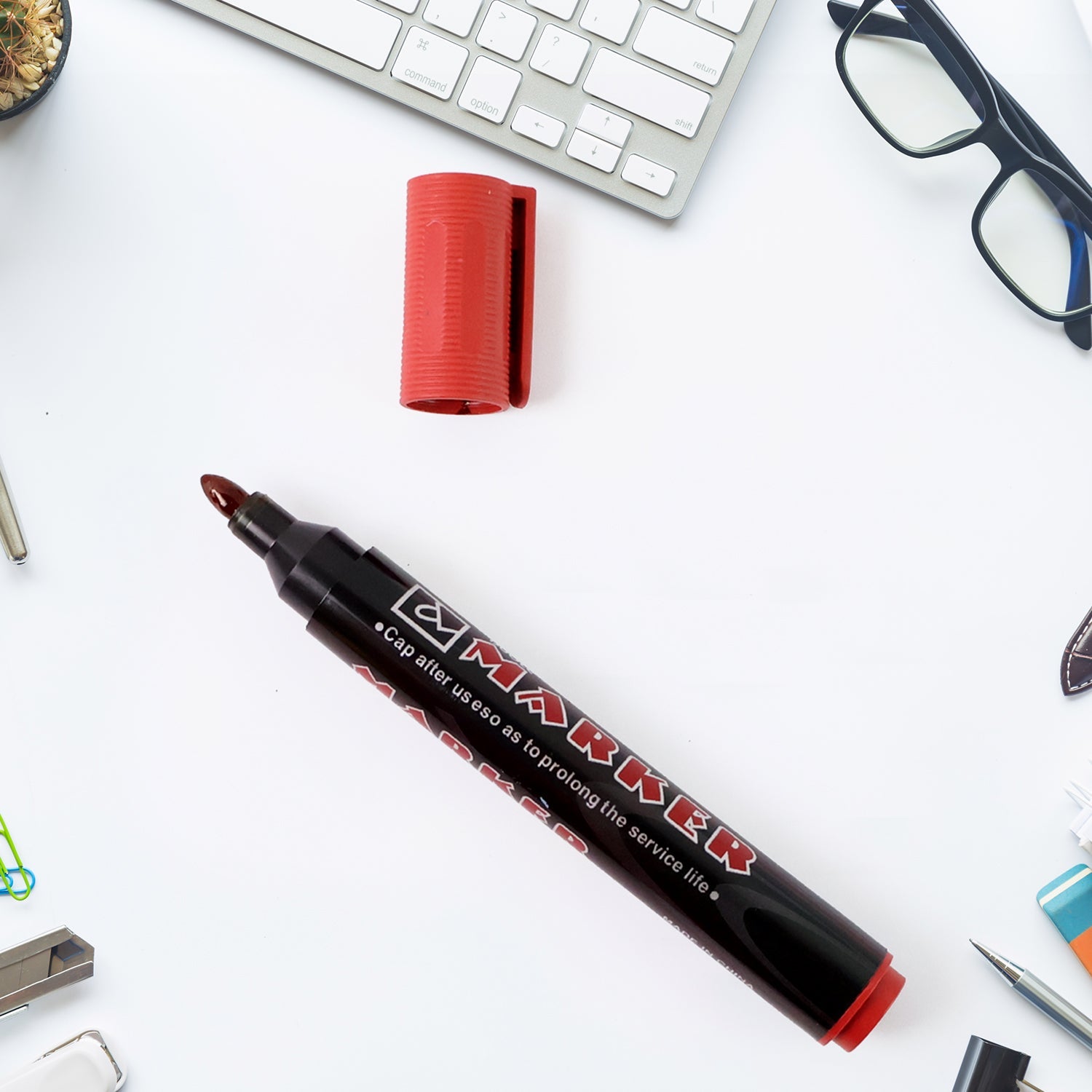 Close-up of red permanent ink marker pen with durable tip