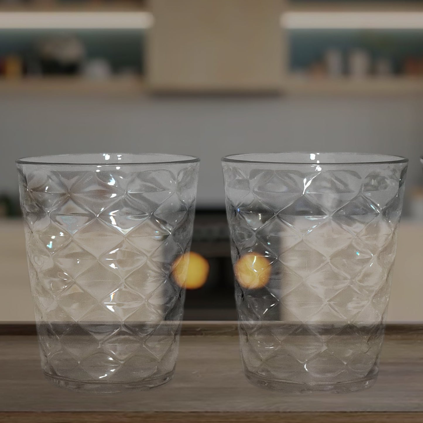 Side view of pyramid plastic glass showcasing wide stable base