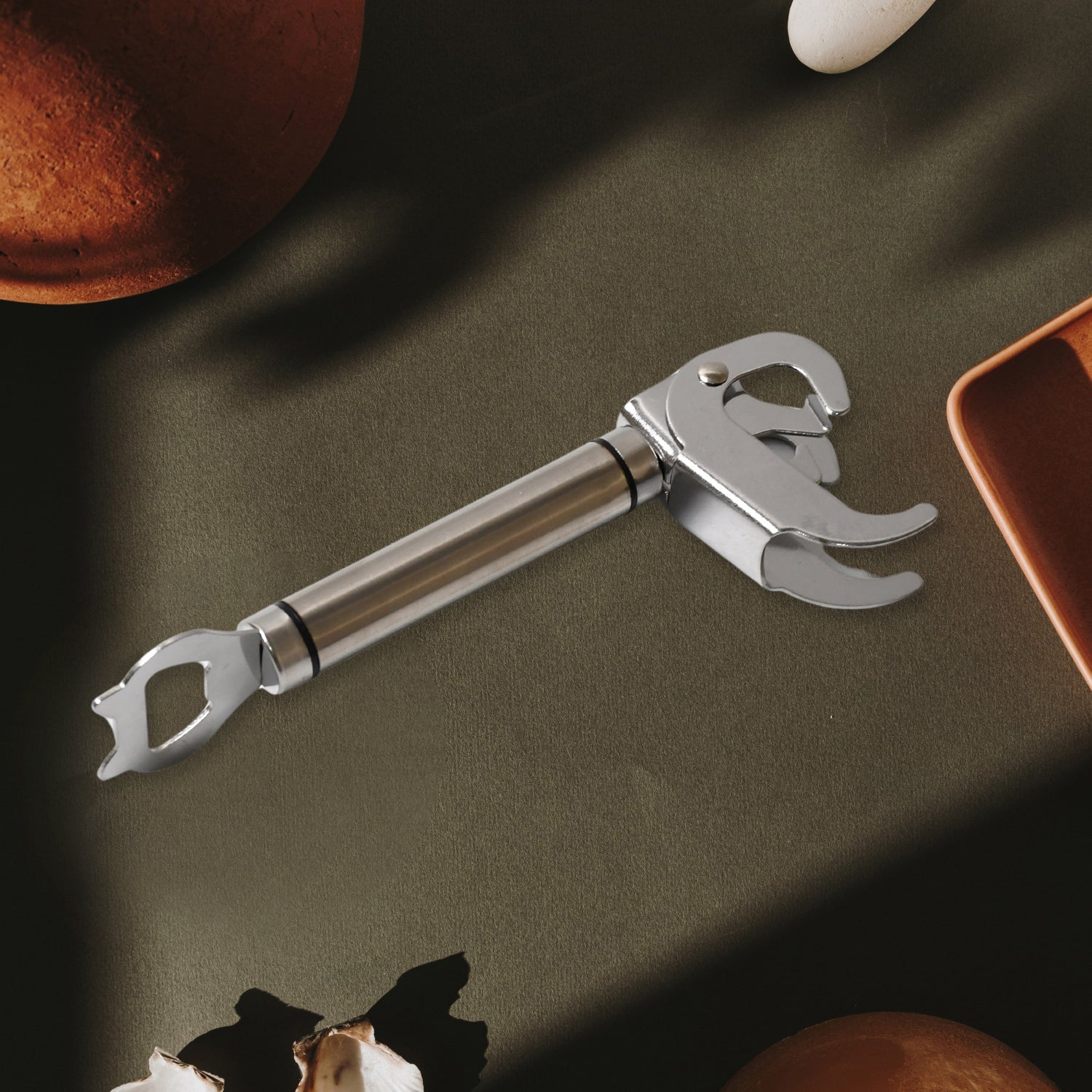 The pot pan gripper firmly holding a hot cooking pot, ensuring a stable and safe lift.