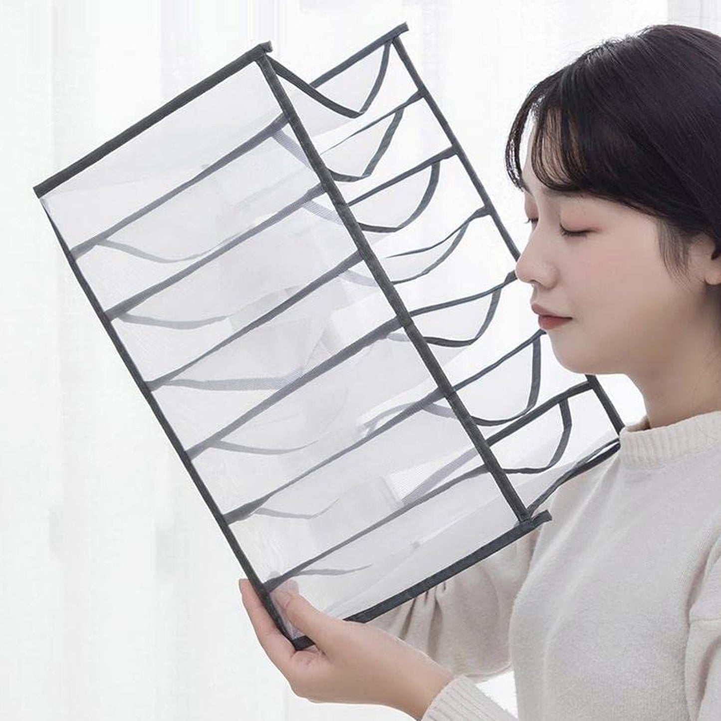 Top view of the Organivo 7 Grid Clothes Organizer filled with neatly folded clothes.