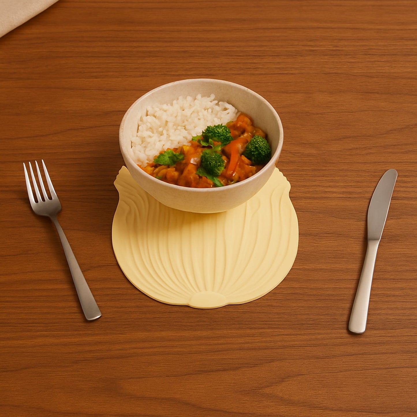 Close-up of a heat-resistant silicone leaf coaster with detailed embossed texture