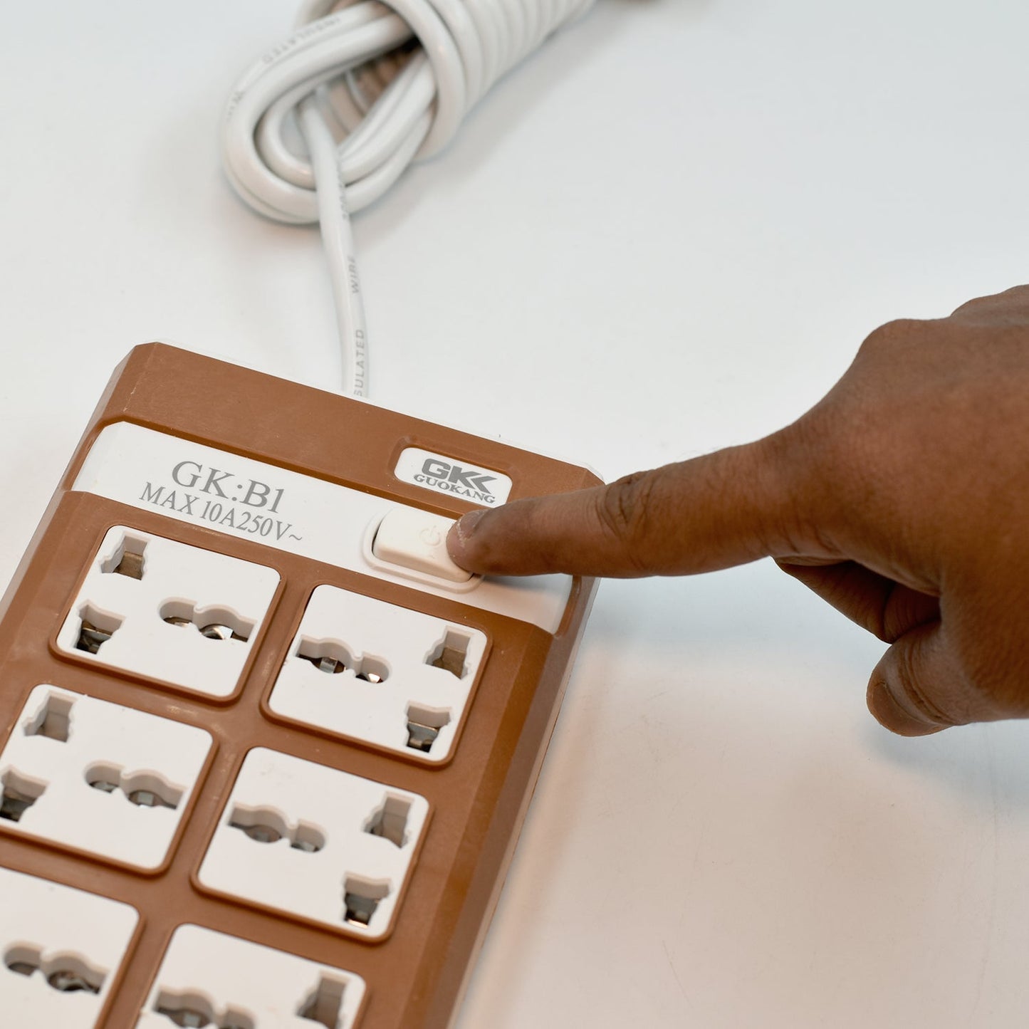 Side profile of the 6-way extension board highlighting its compact design.