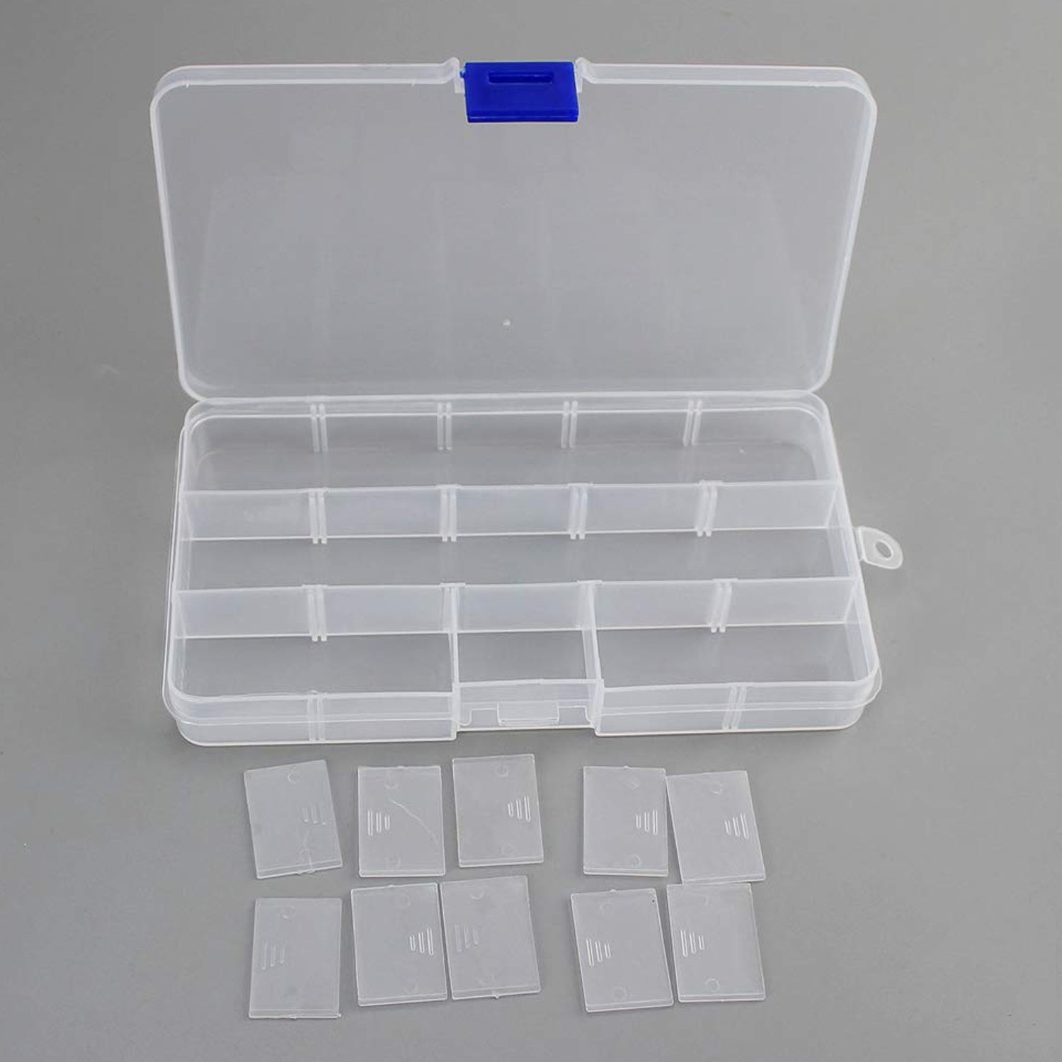 Compact and portable 15-grid plastic organiser for rings, earrings, and small trinkets.