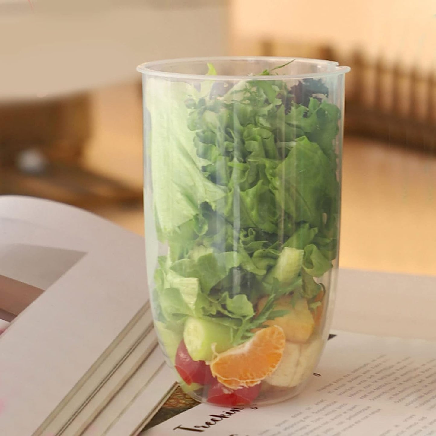 Compact salad mixing cup, ideal for travel and quick meals