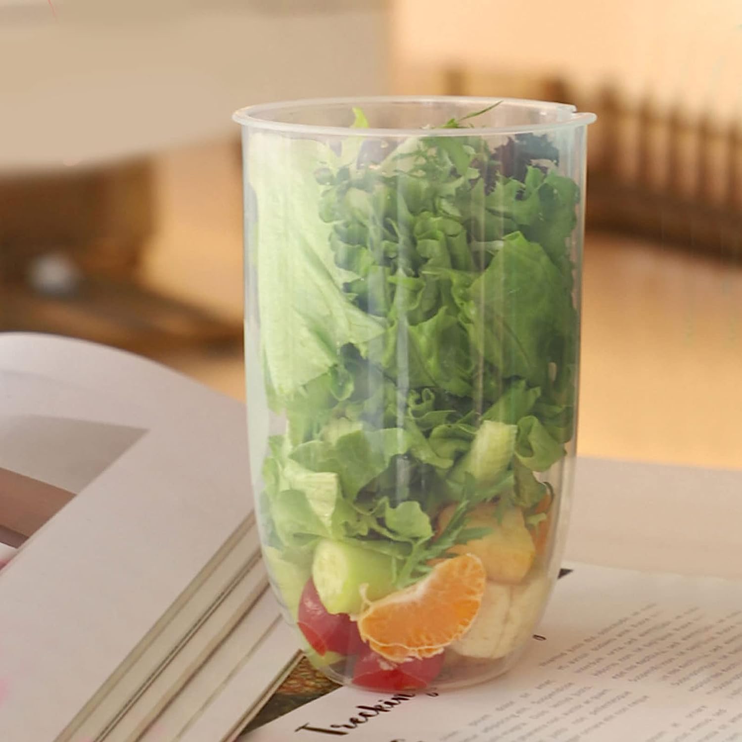 Compact salad mixing cup, ideal for travel and quick meals