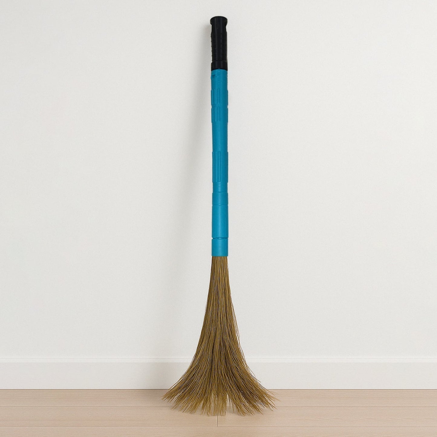 Close-up view of floor broom head with synthetic bristles