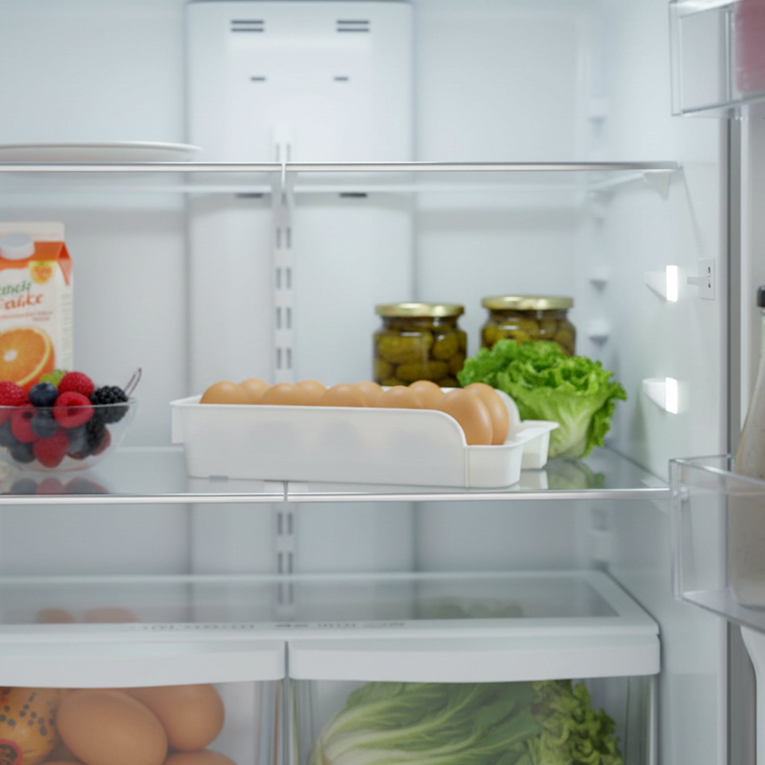 Egg tray with slots for refrigerator storage