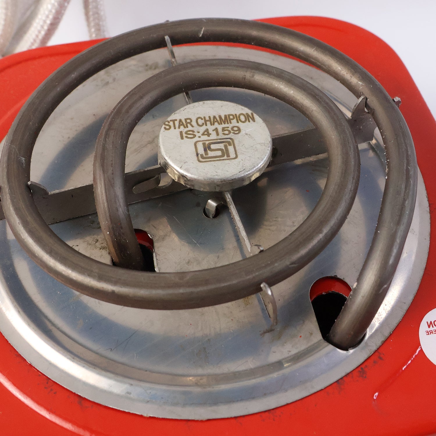 Close-up of coil stove electric hot plate single burner for boiling and frying