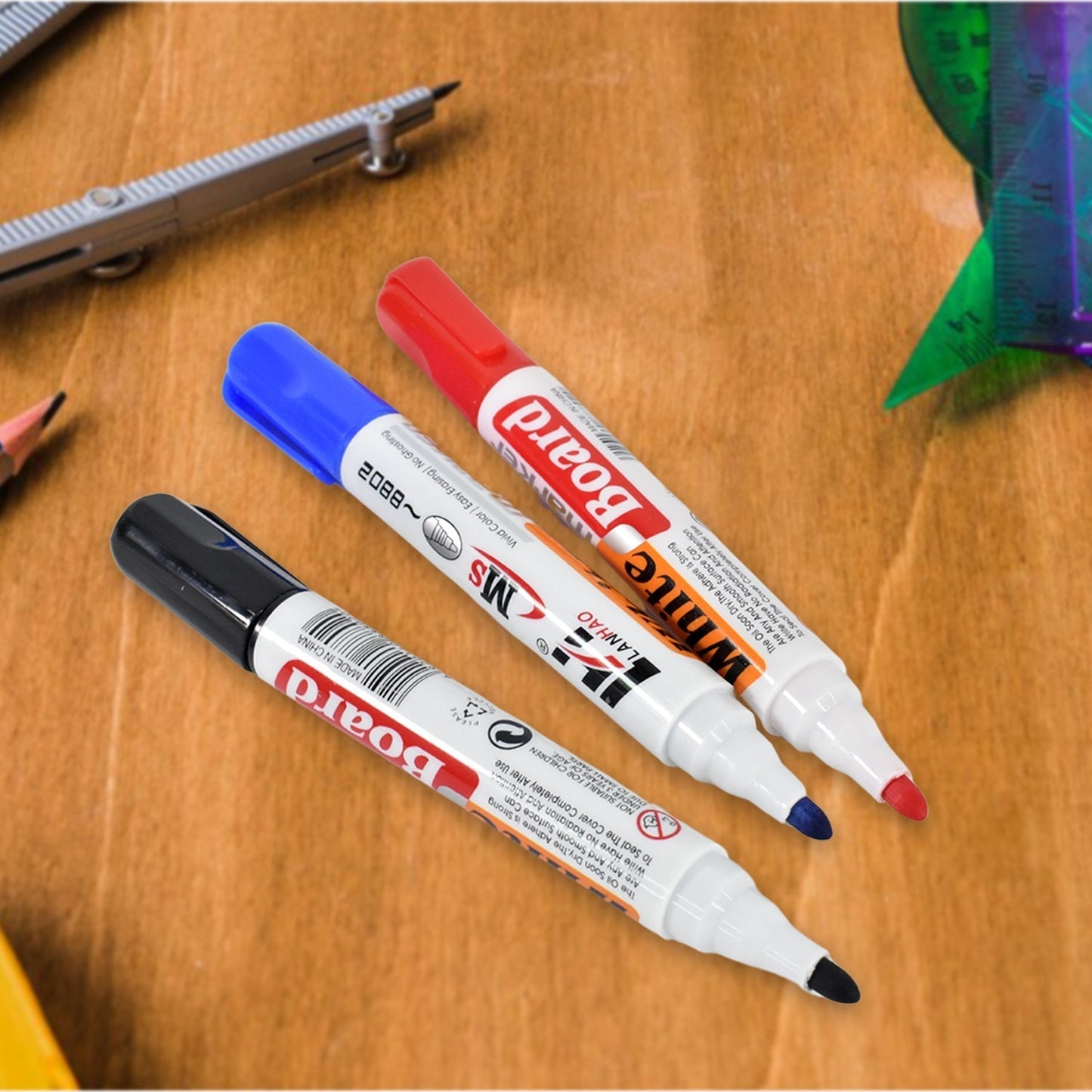 Blue, black and red whiteboard markers with a handy board duster
